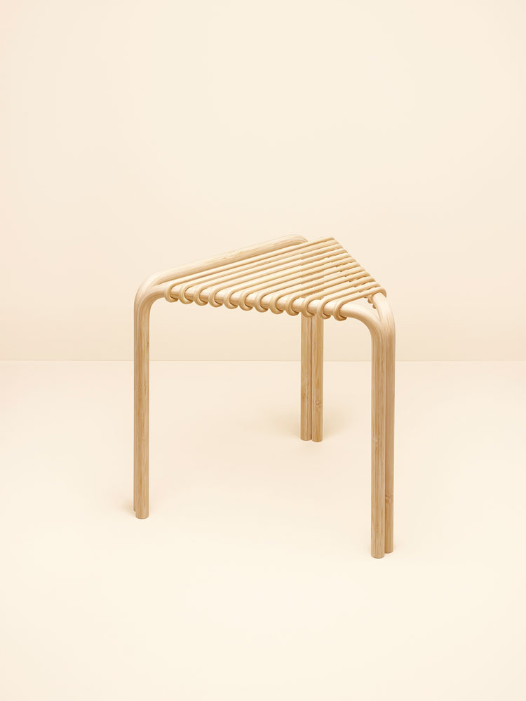In the Pritzker-winning architect's poetic modernist manner, the Alvaro Siza chair, Karumi, is "drawn in bamboo like simple strokes of light." Photo by Maud Rémy-Lonvis