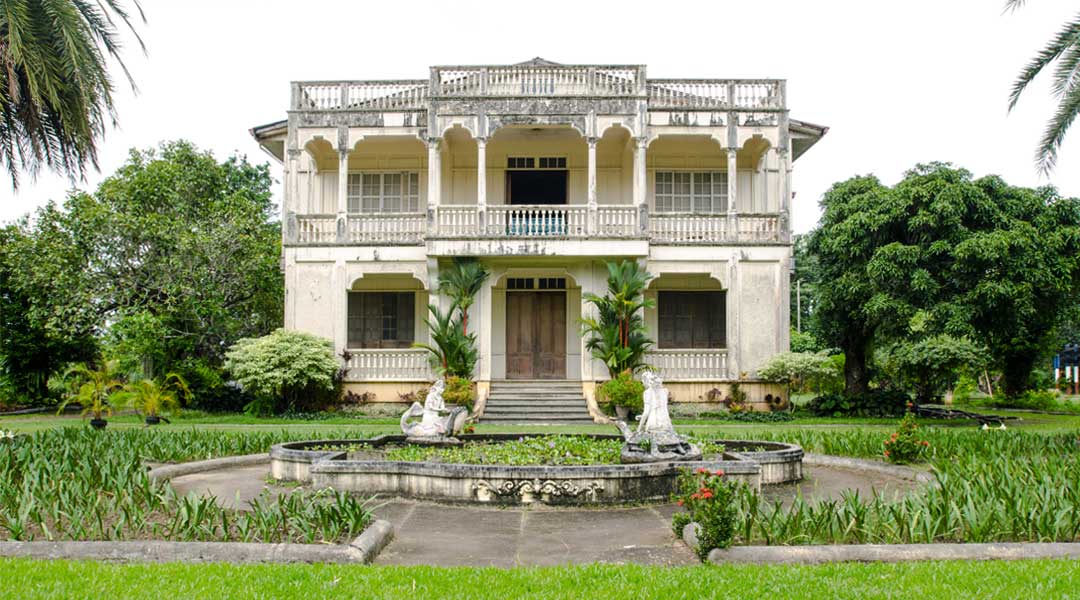 The front facade of the Jose Gaston ancestral house, with a fountain that was also designed by the patriarch.