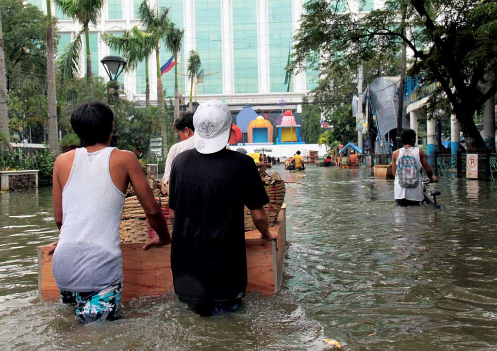 Flooding from Typhoon Ondoy (Ketsana), Philippines 2009. Photo courtesy of AusAID (via Wikimedia Commons)