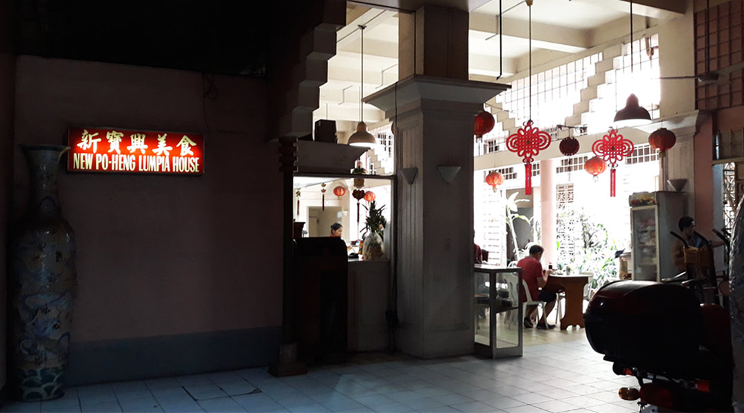 The bright red signage of New Po-Heng Lumpia House greets visitors before one enters the eatery by the courtyard of Uysubin Building in Binondo.