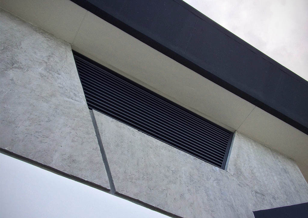 Louvered openings for cross-ventilation to
effectively minimize the heat coming down to interior spaces.