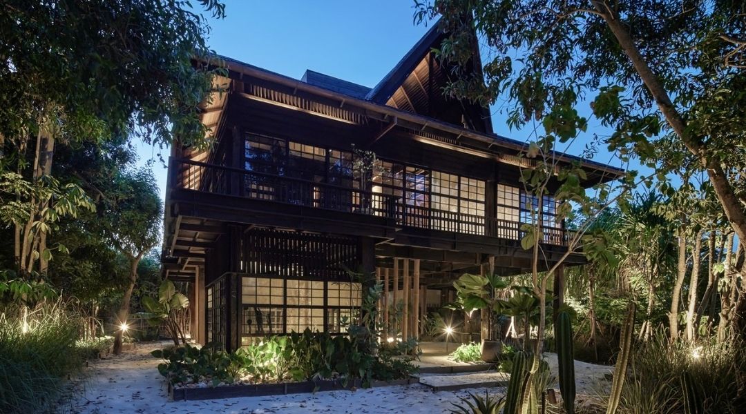 a balinese two storey home made from reclaimed wood.