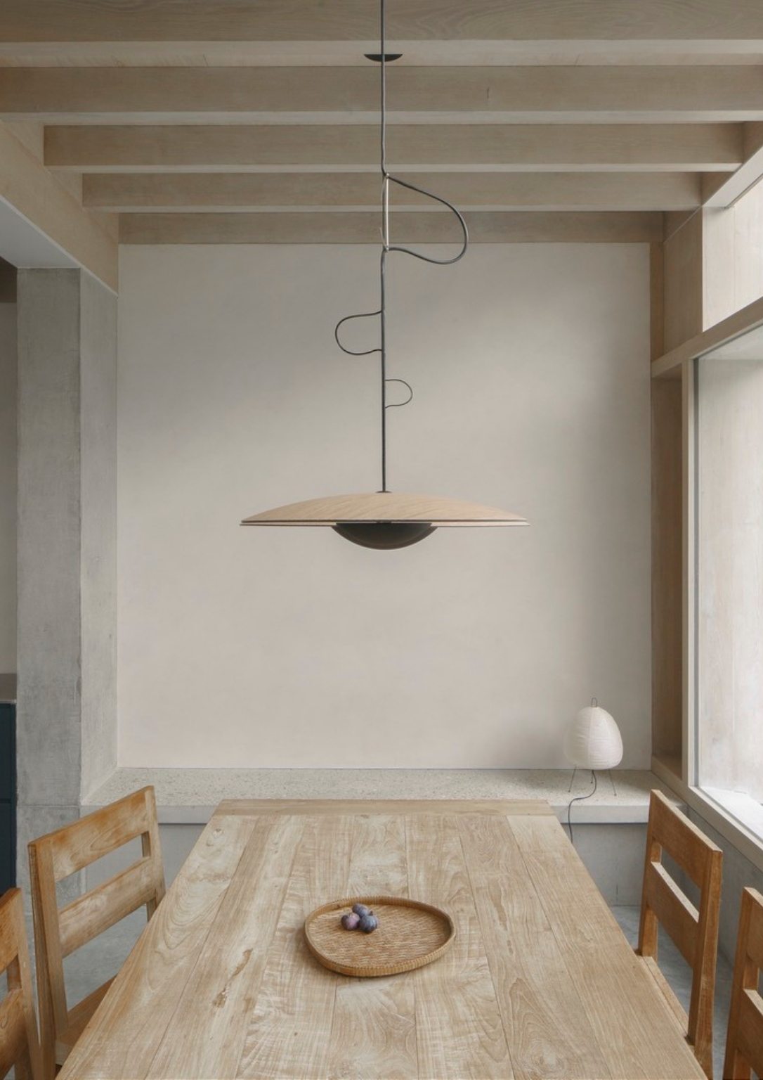 view of dining area with modern pendant lighting