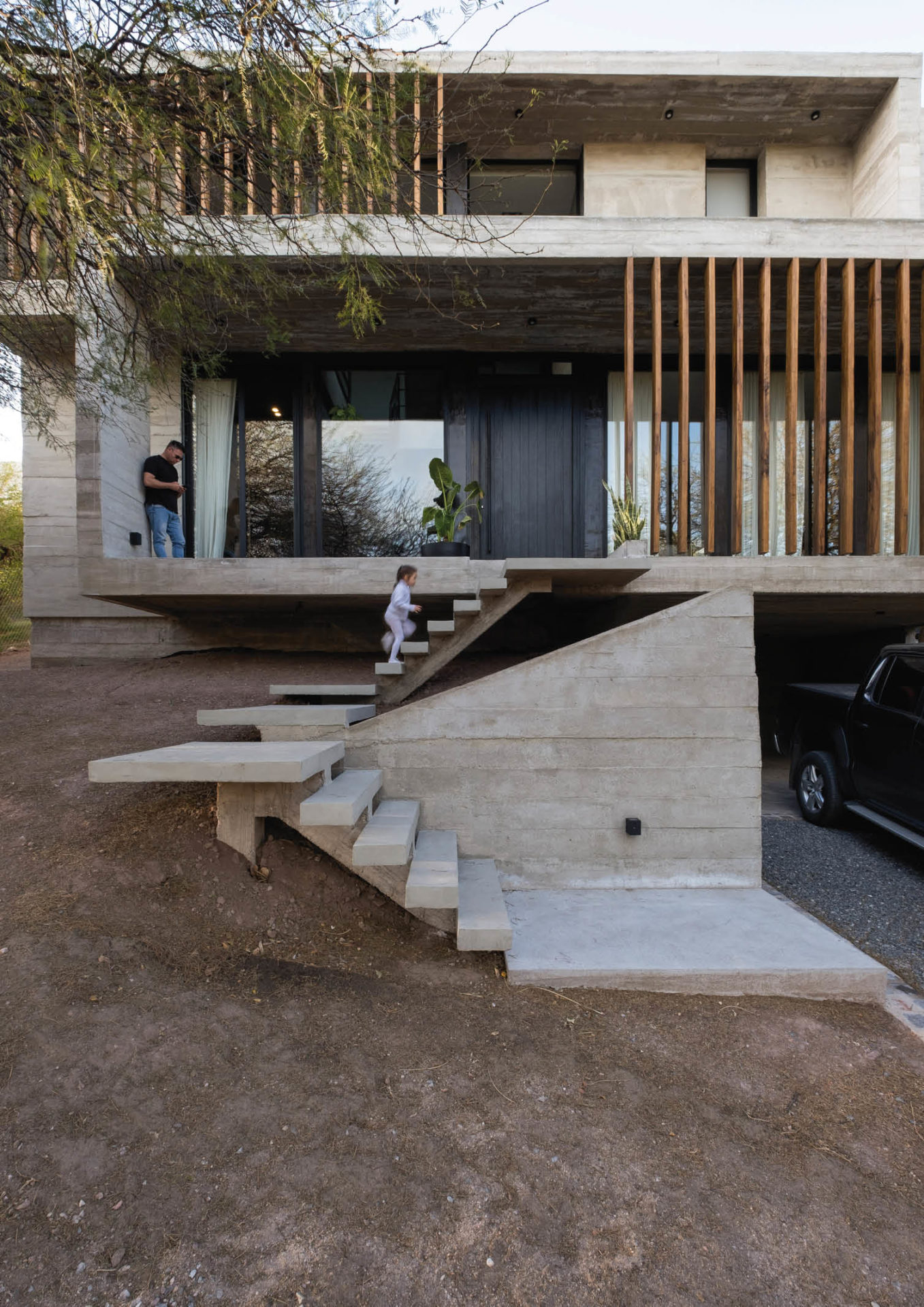 This Single Concrete Volume House Blends with Nature - BluPrint