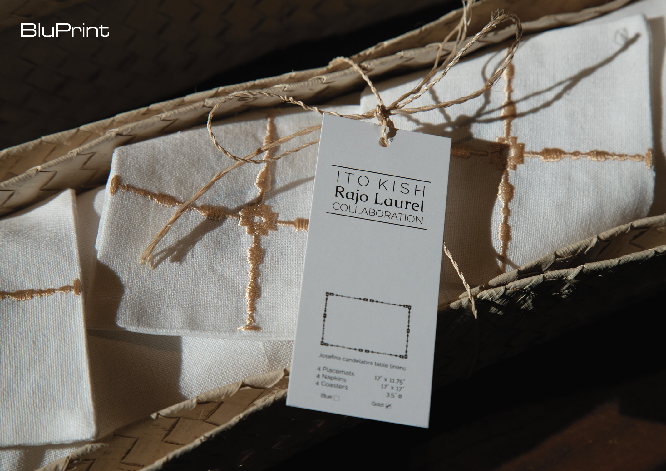 linen napkins with candelabra motif in woven packaging