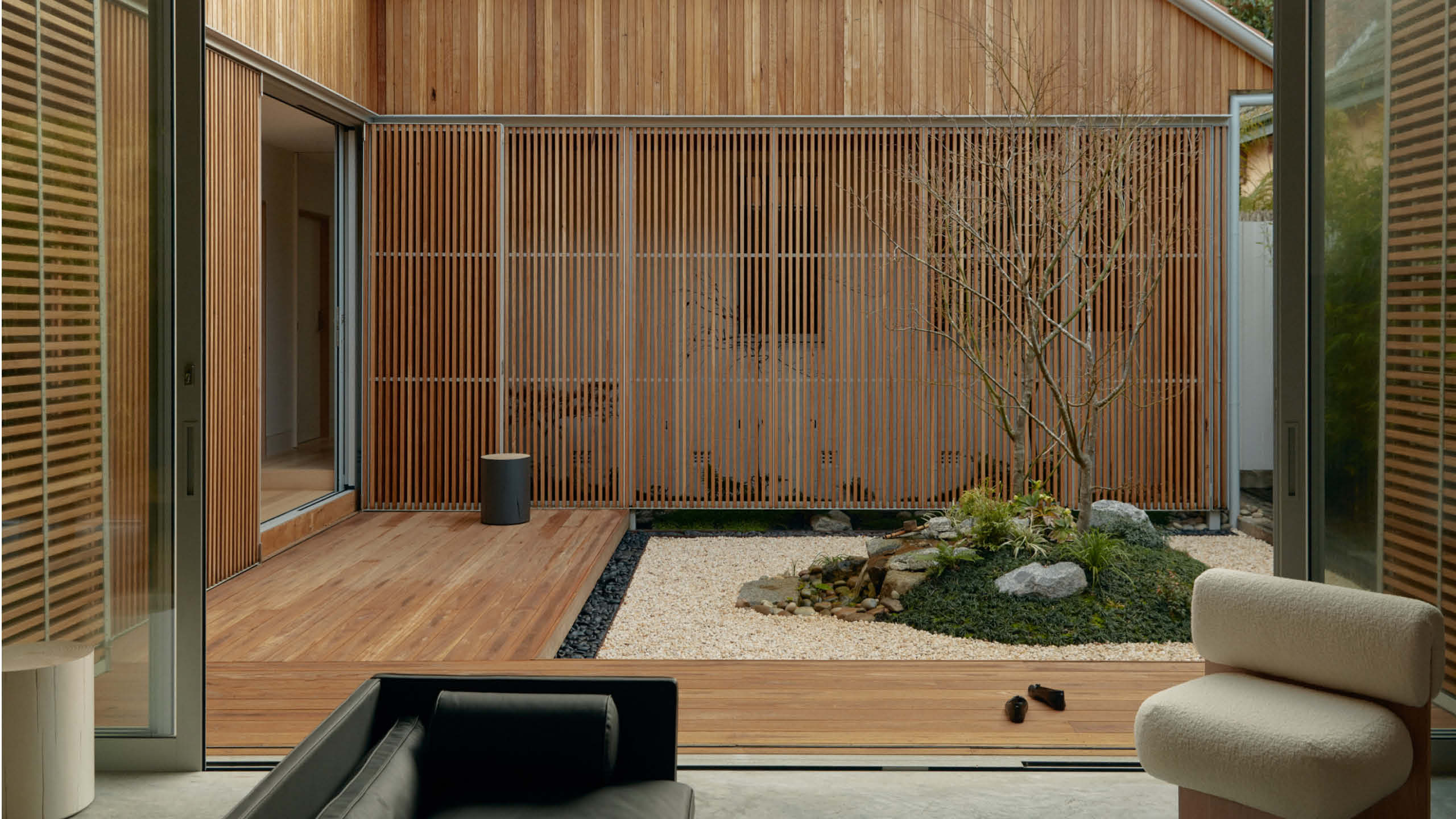 The Japanese maple tree in the middle of the Courtyard house is the house's spiritual center. Image by Tom Ross