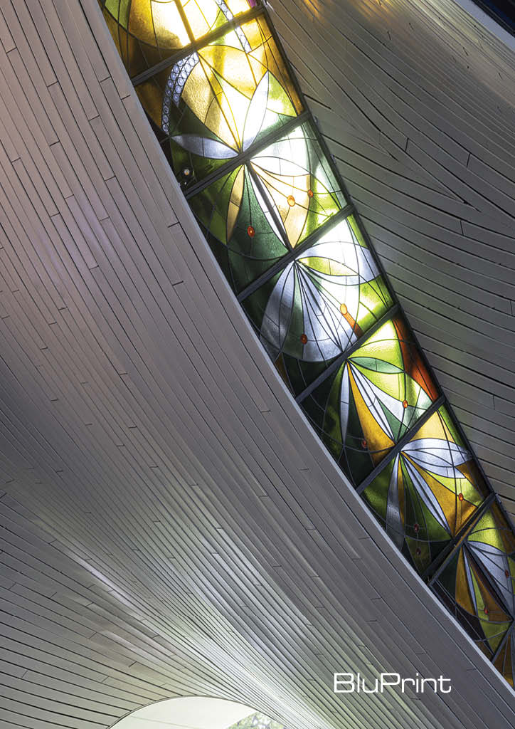 Detail shot of the stained glass art on the ceiling of Our Lady of Lourdes Chapel