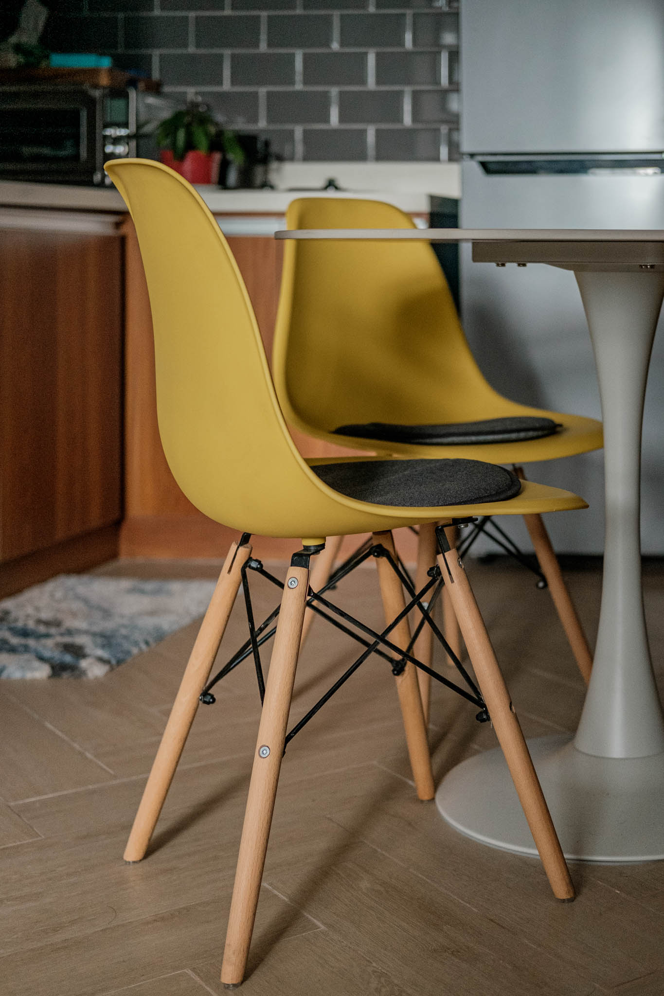 Eames-inspired yellow eggshell chair