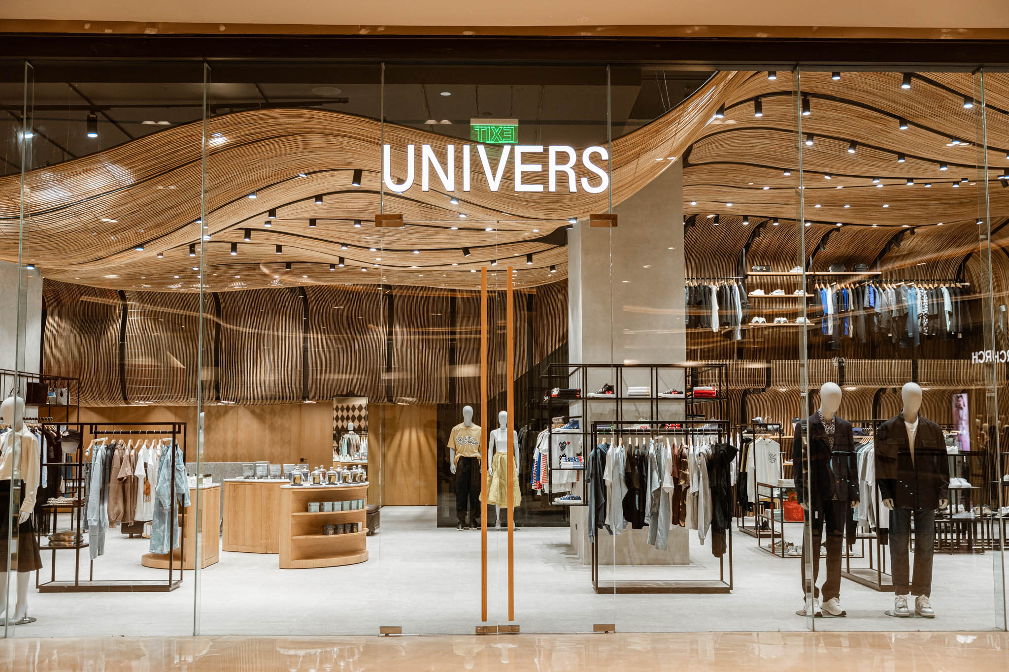 The UNIVERS NUSTAR storefront featuring its unique laminated rattan installation.