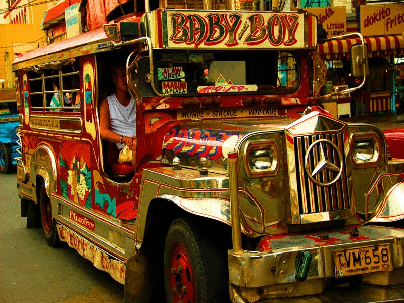 A colorful jeepney plying the streets of manila, another potential victim of the jeepney phaseout.