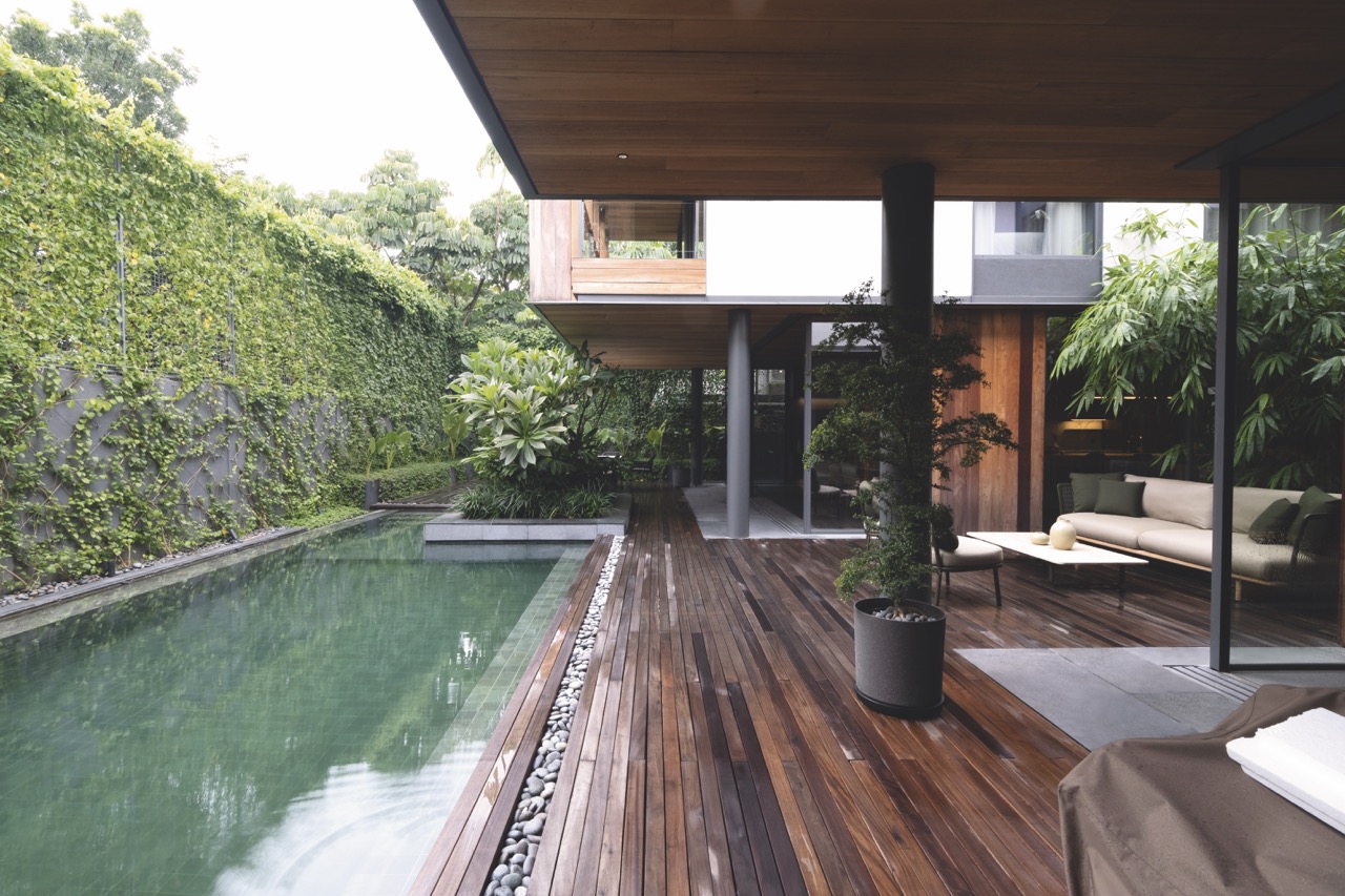 Modern home backyard with a pool featured in the book, Architecture of Silence by BluPrint.