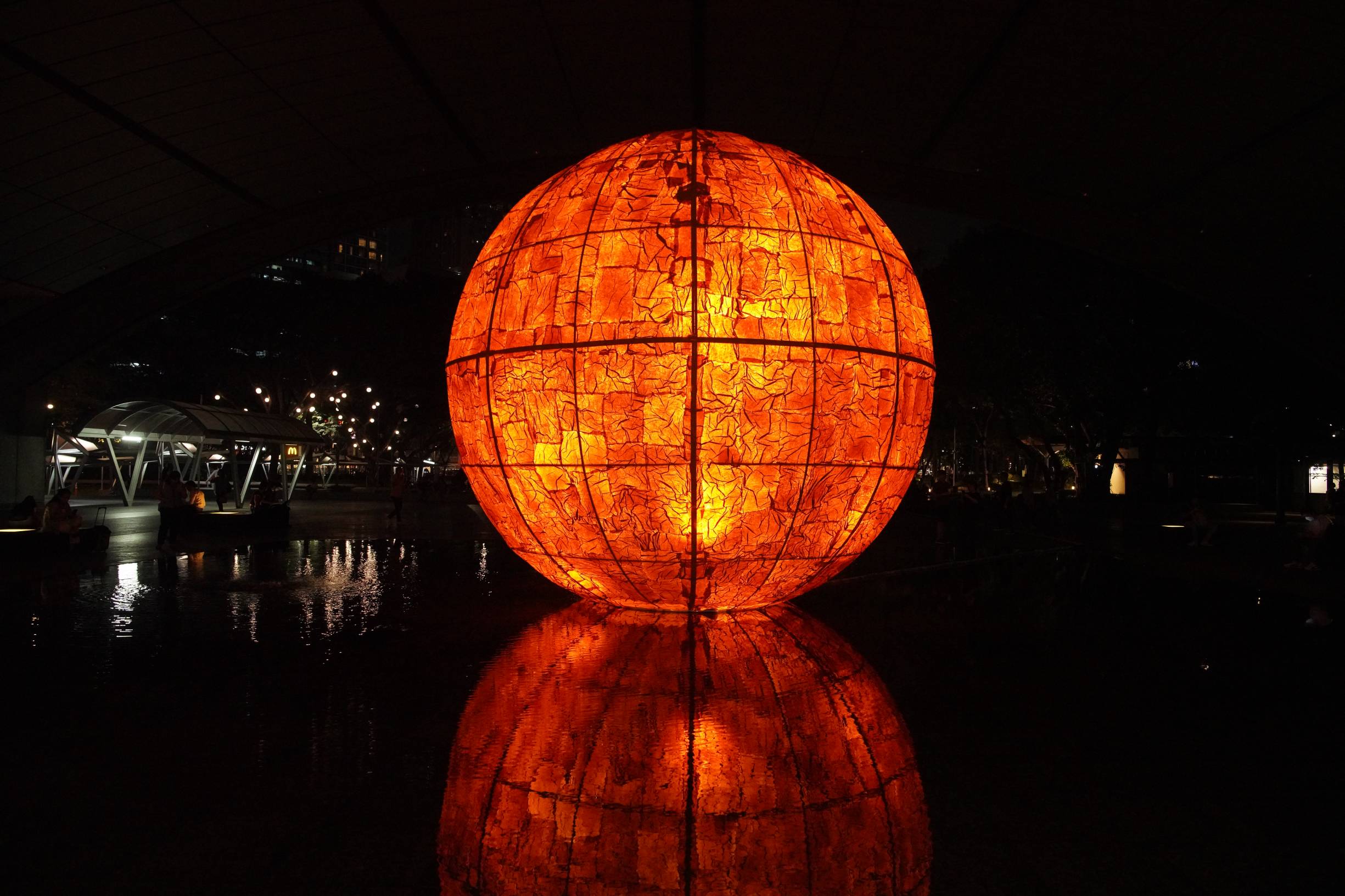 A giant orange sphere, an art exhibition that is part of Art Walk 2024 and Art Fair PH 2024.