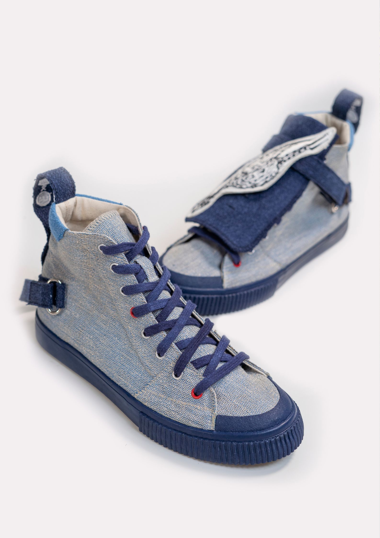 Blue LakArt sneakers by Lilianna Manahan.