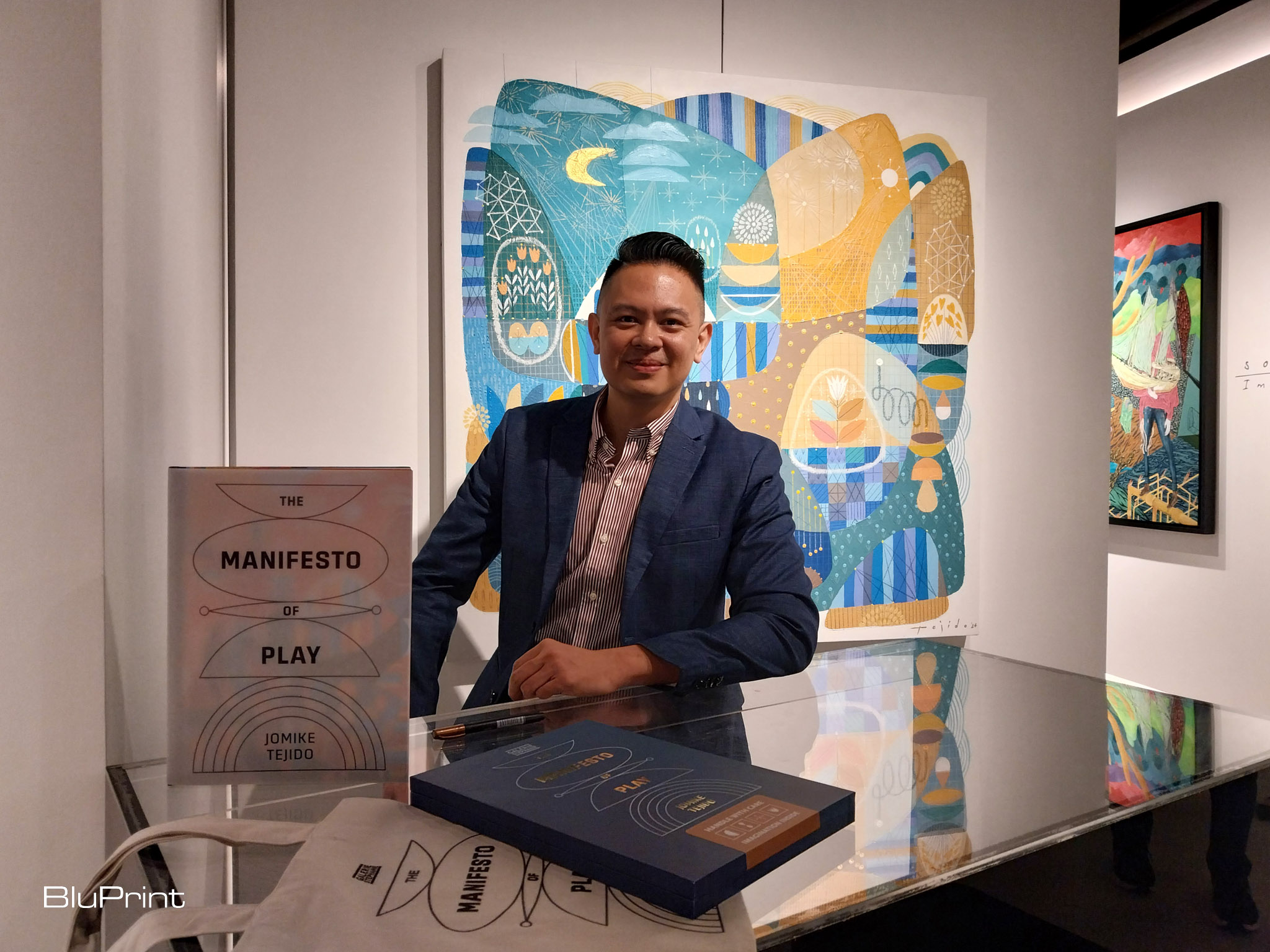 Jomike Tejido and his new book and exhibit "Manifesto of Play." Photo by Elle Yap.