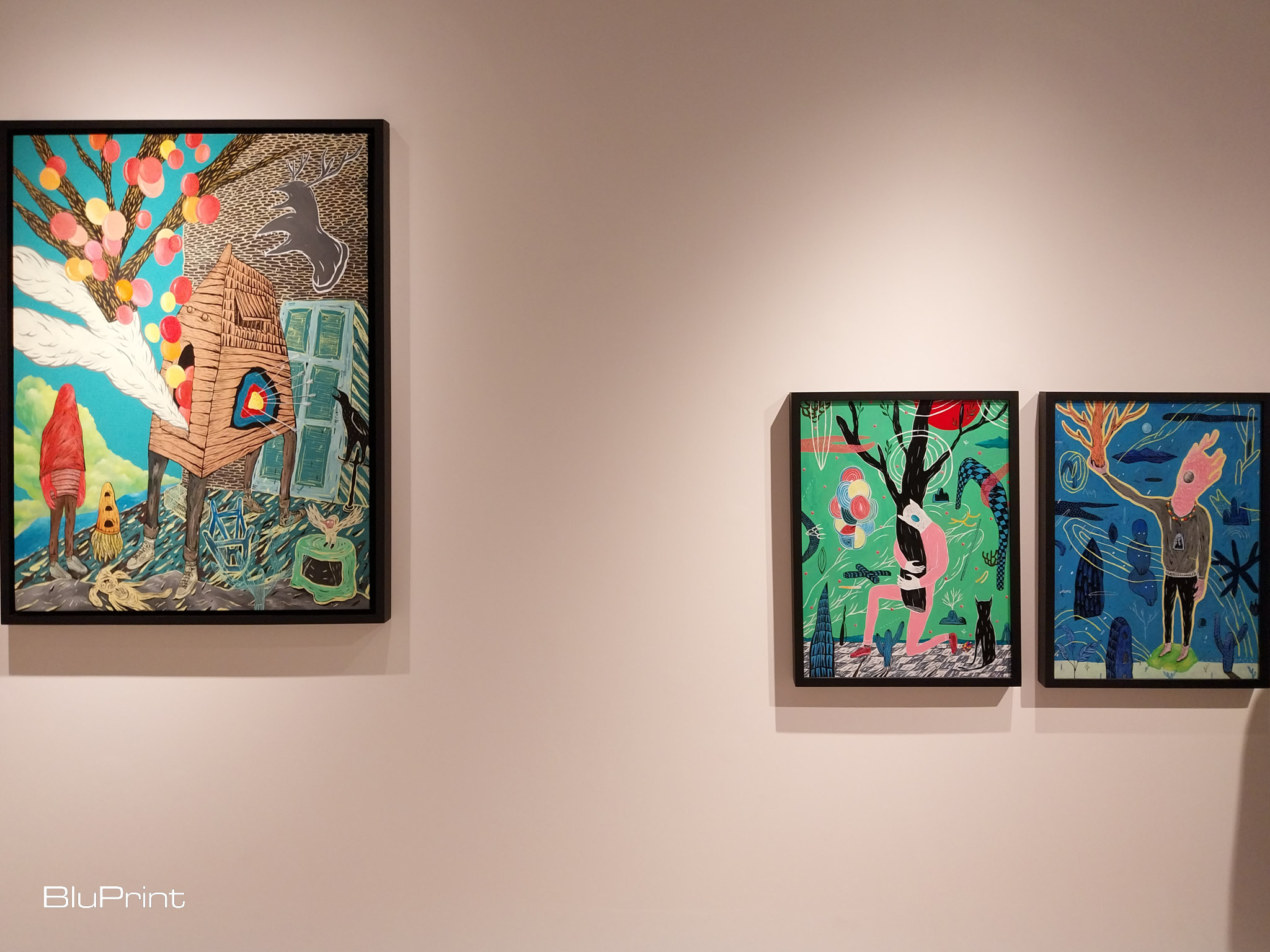 Three paintings from Imam Santoso's "Solitude" exhibit in Galerie Stephanie. Photo by Elle Yap.