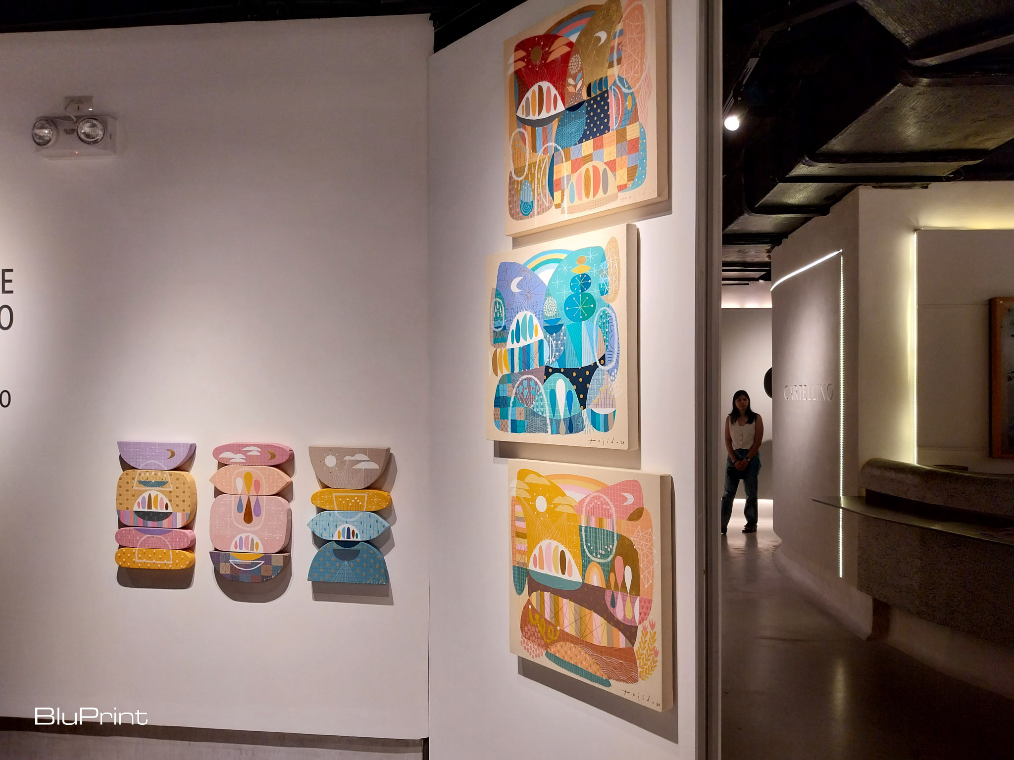 Multiple paintings by Jomike Tejido at Galerie Stephanie. Photo by Elle Yap.