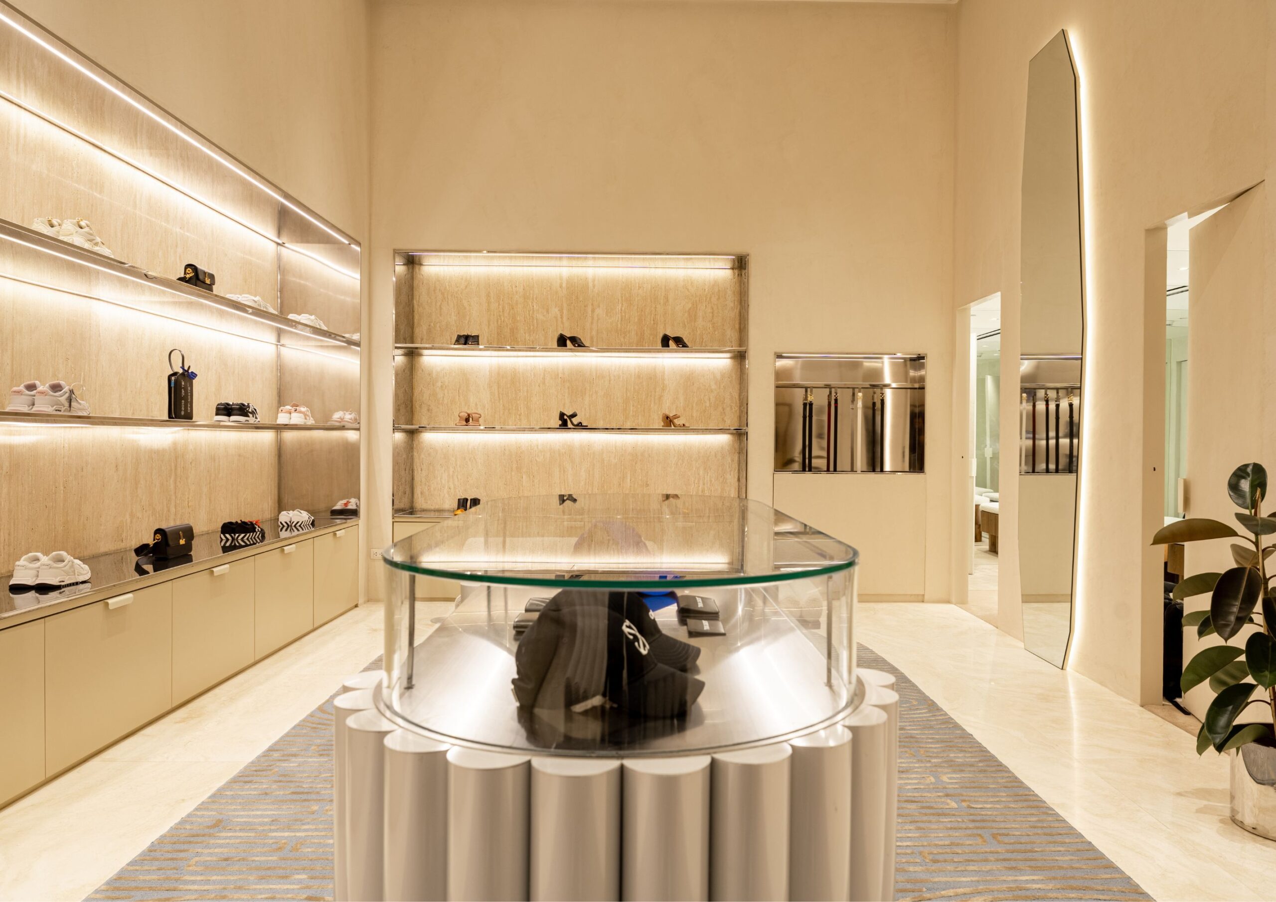 Interior Off White store with minimalist off white interiors and high end designer fashion items.
