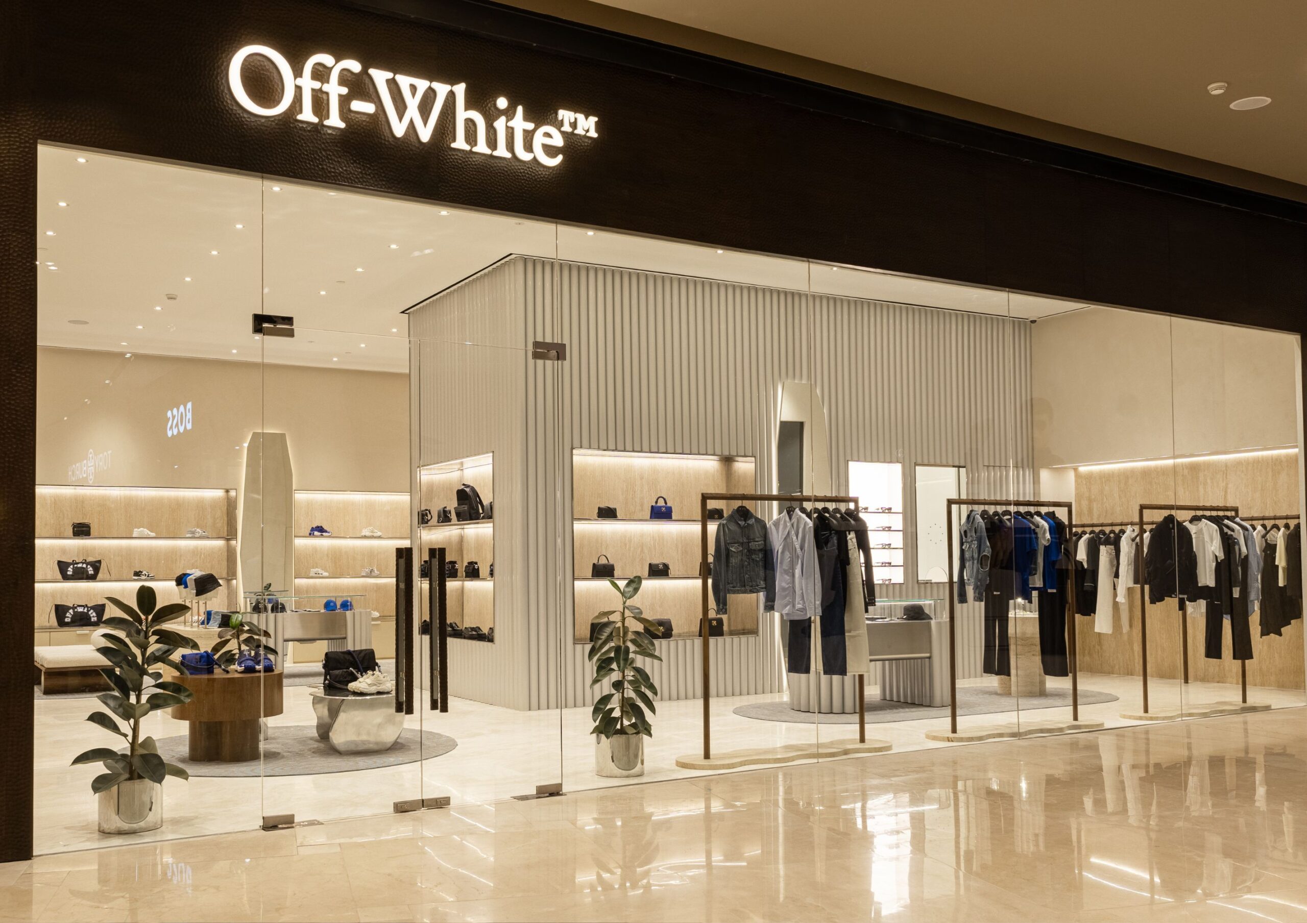 Store front Off White with minimalist off white interiors and high end designer fashion items.