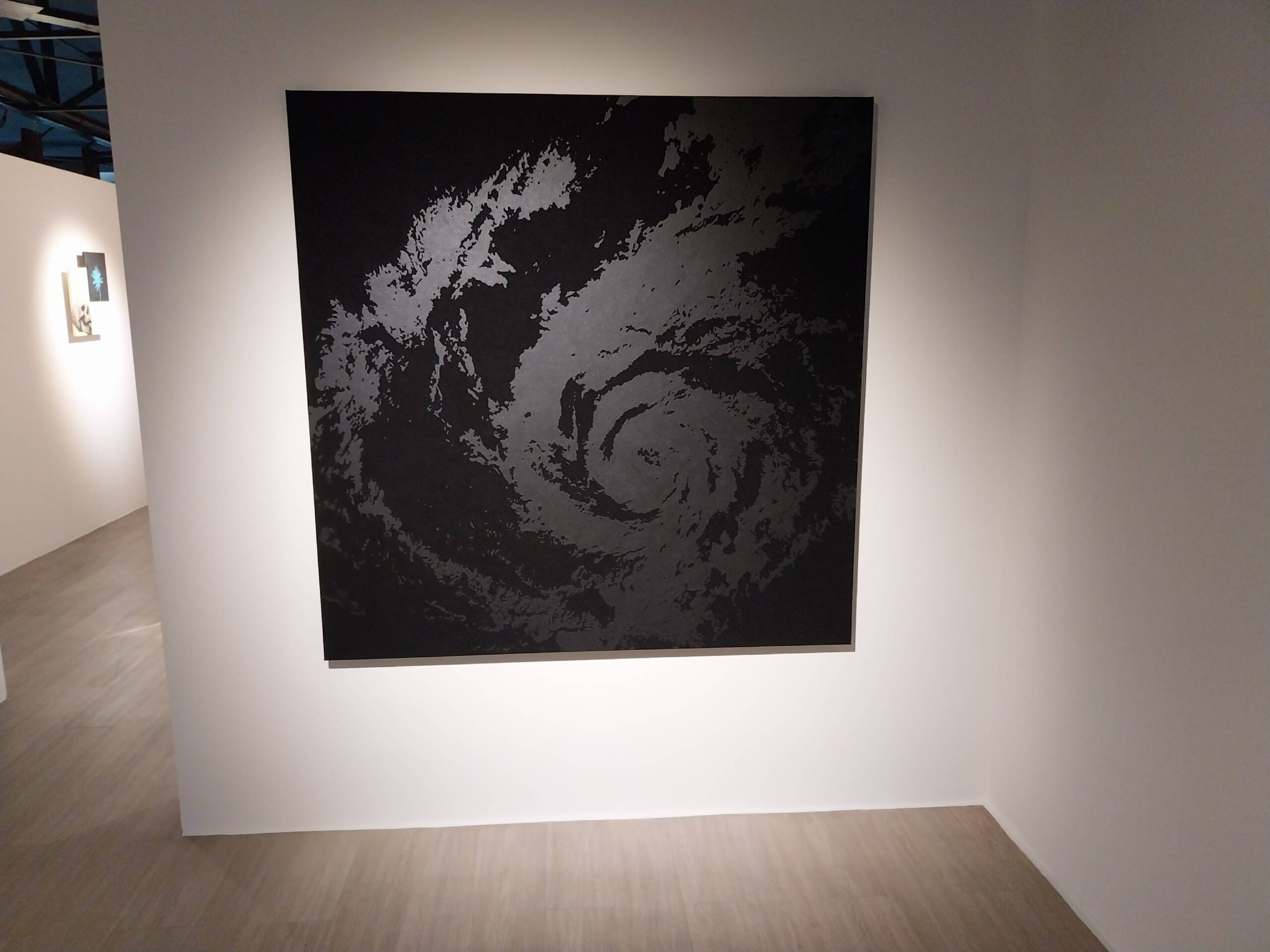 A painting of a typhoon cloud. Photo by Elle Yap.