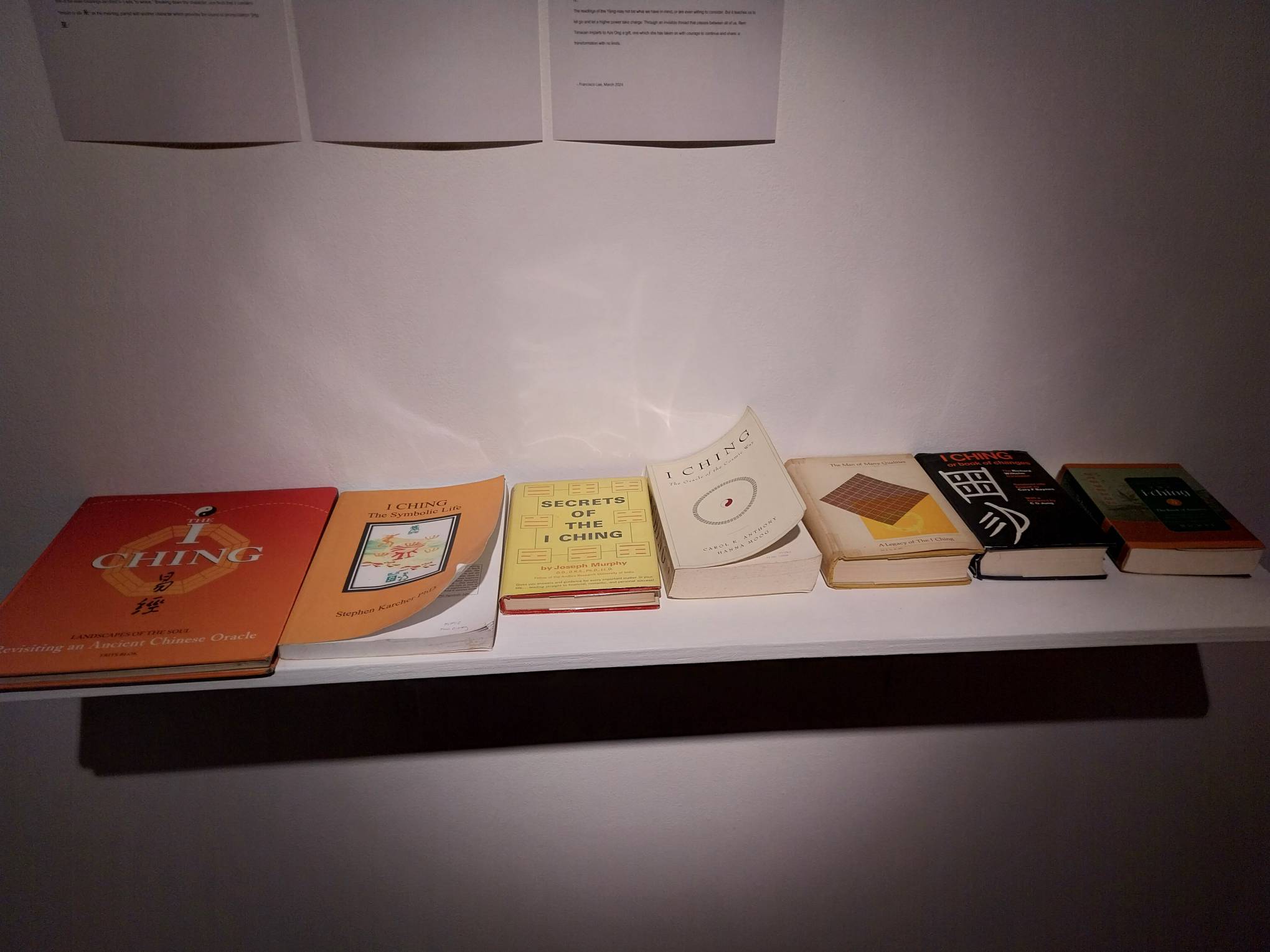 Books on I Ching being exhibited at Gravity Art Space. Photo by Elle Yap.