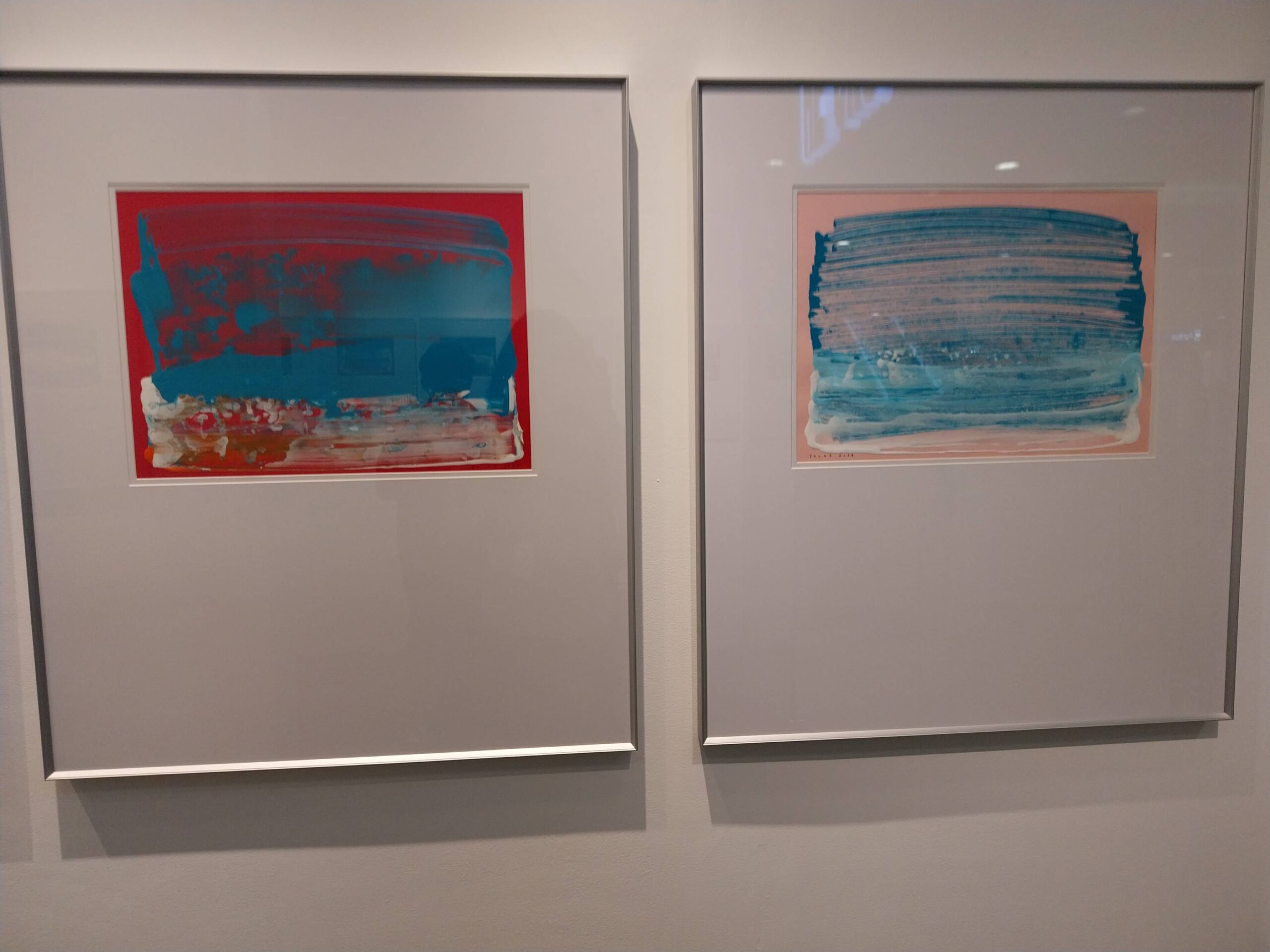Abstract paintings that were featured in the exhibit. Photo by Elle Yap.