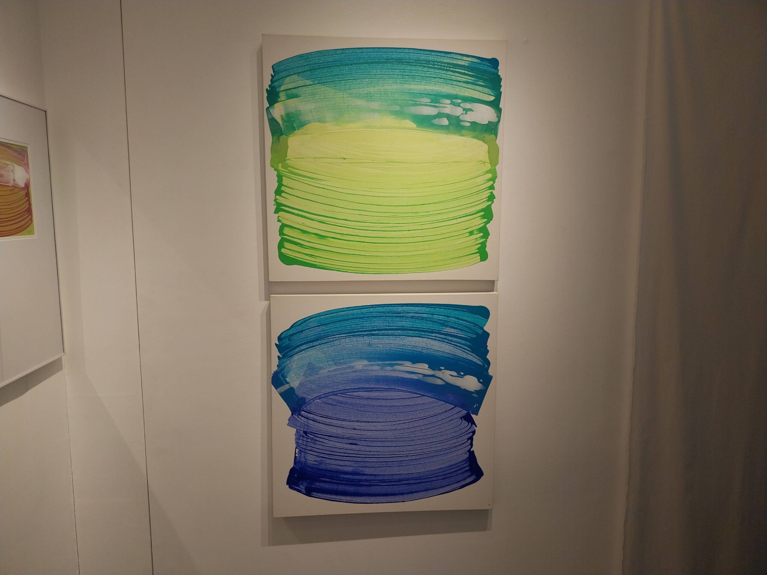 Two painting for "Clouds Come Floating." Photo by Elle Yap.