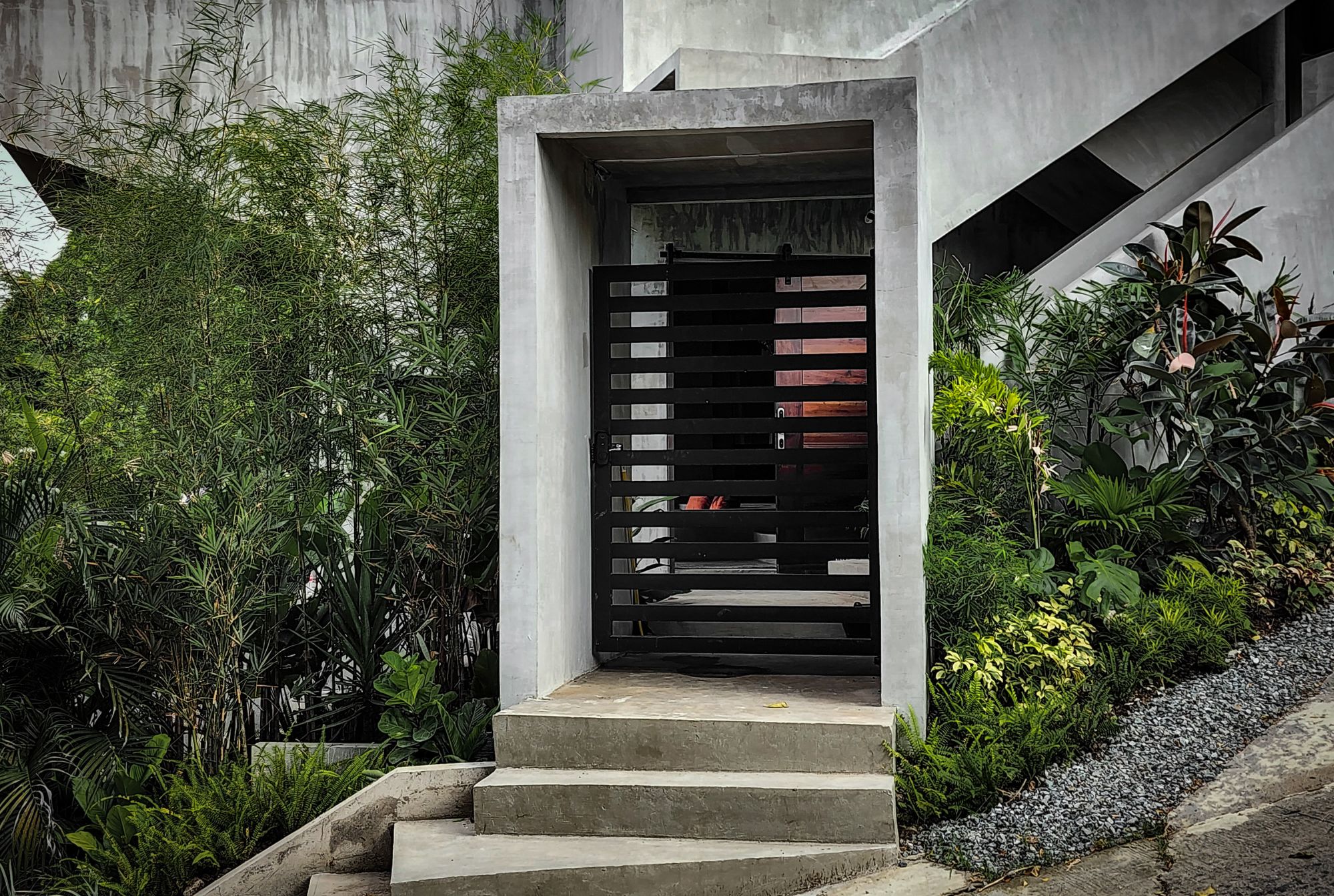 the entrance to Casa Borbon, vacation villa in the style of tropical brutalism.