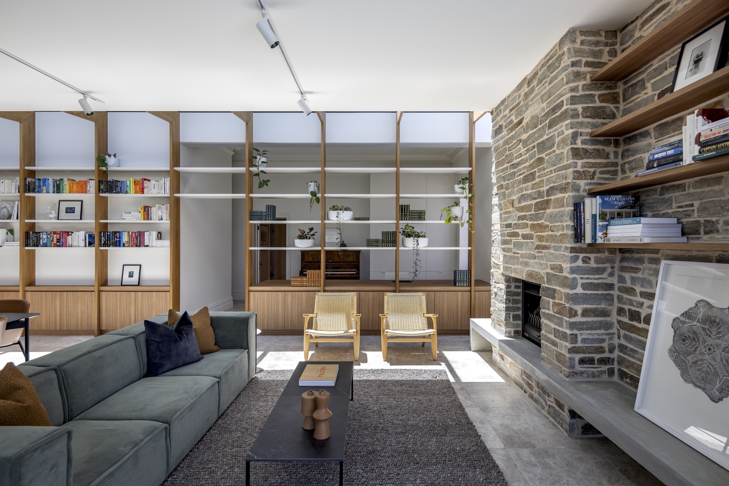 The communal area with its brick fireplace. Photo by Art Department Creative.