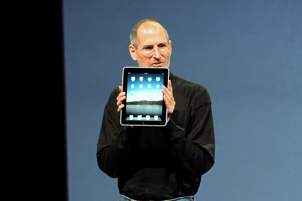 Steve Jobs presenting the original Apple iPad. Photo by matt buchanan. Source: Wikimedia Commons.