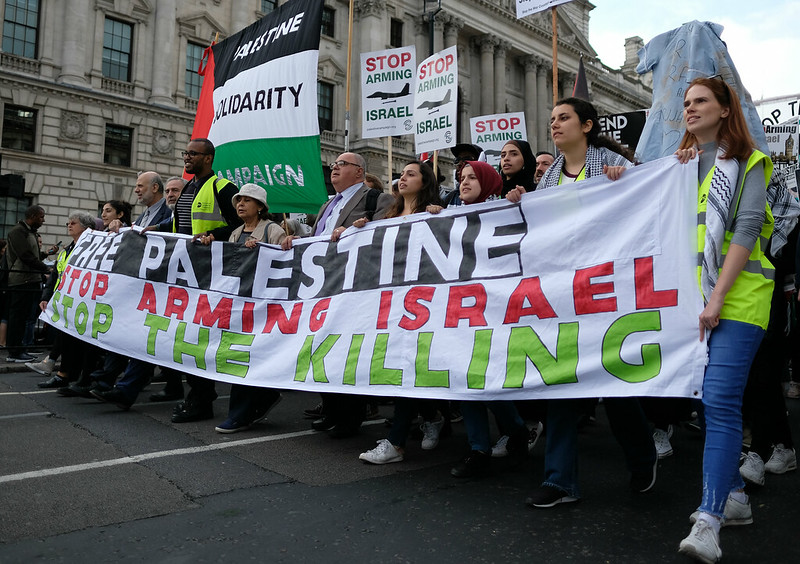 Pro-Palestinian protesters march towards British parliament. Photo by Alisdare Hickson. Source: Flickr.