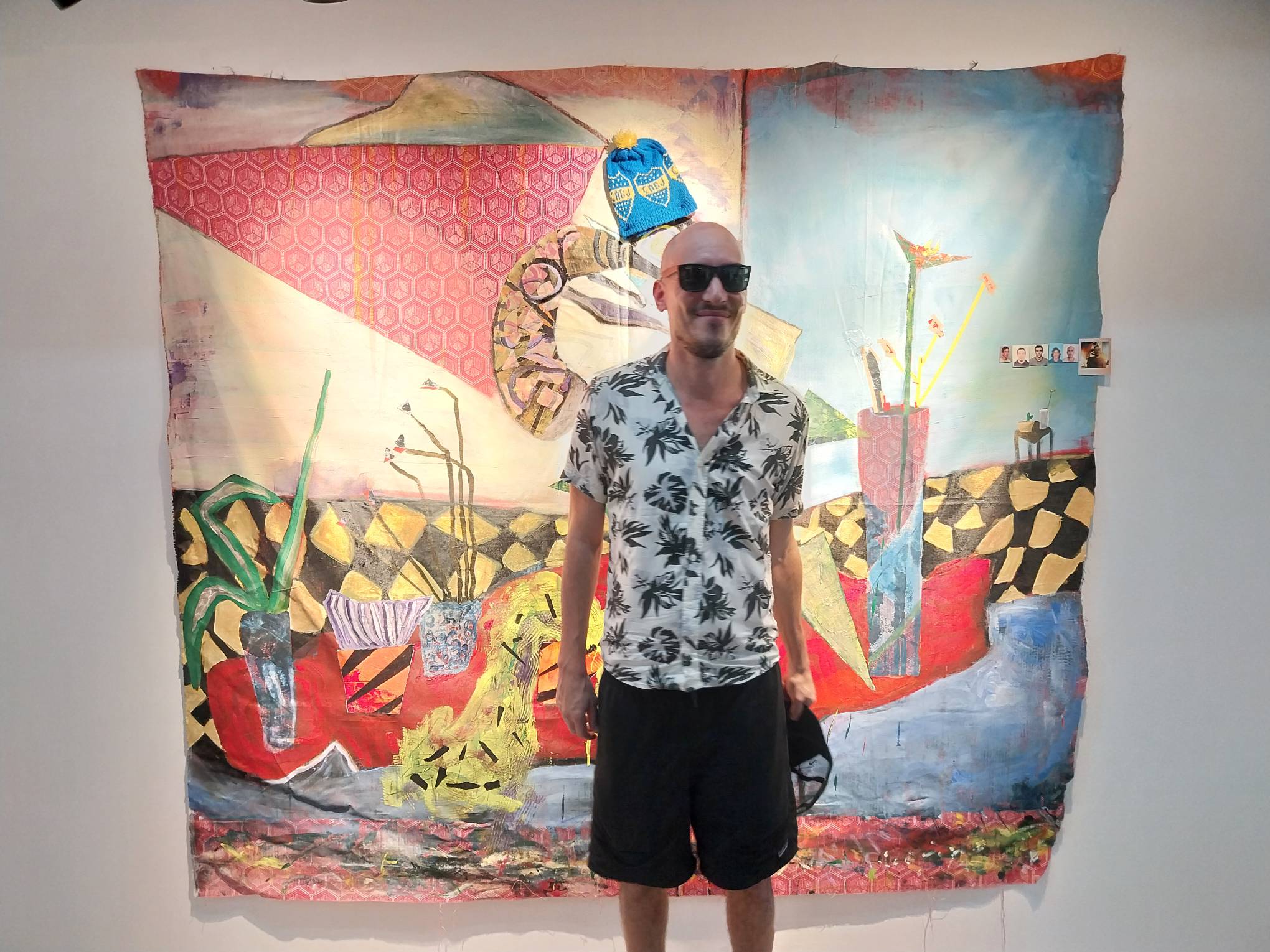 Joaquín Goldstein in front of one of his works. Photo by Elle Yap.