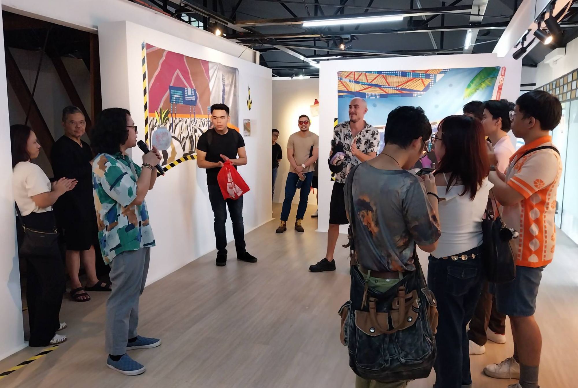 The crowd in the midst of discussion during the Gravity Art Space Artist Talks. Photo by Elle Yap.