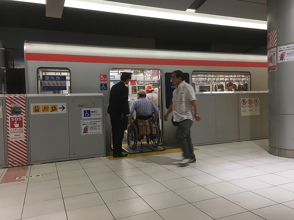 Accessible wheelchair ramp for train in Tokyo. An example of disability architecture at work. Photo by Nesnad. Source: Wikimedia Commons.