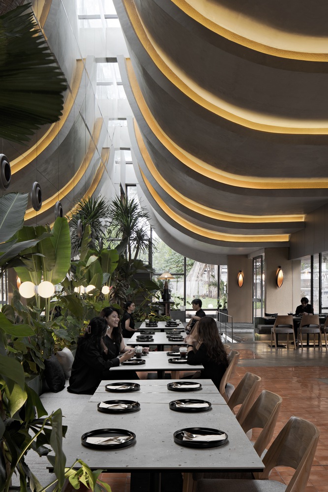 Interior of the restaurant in the ground floor of the structure. Photo by Mario Wibowo.