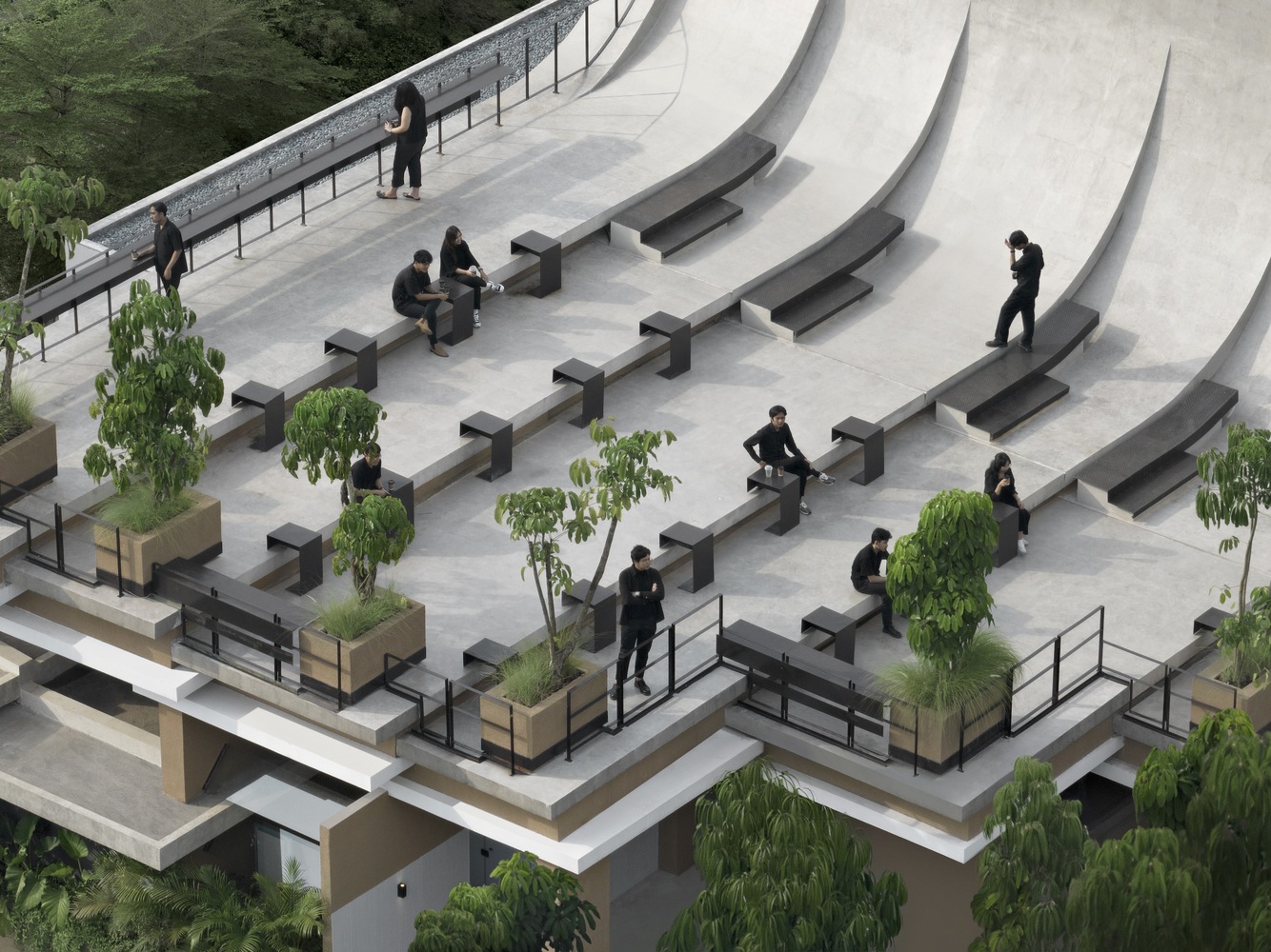 The half-pipe roof and amphitheater from afar. Photo by Mario Wibowo.