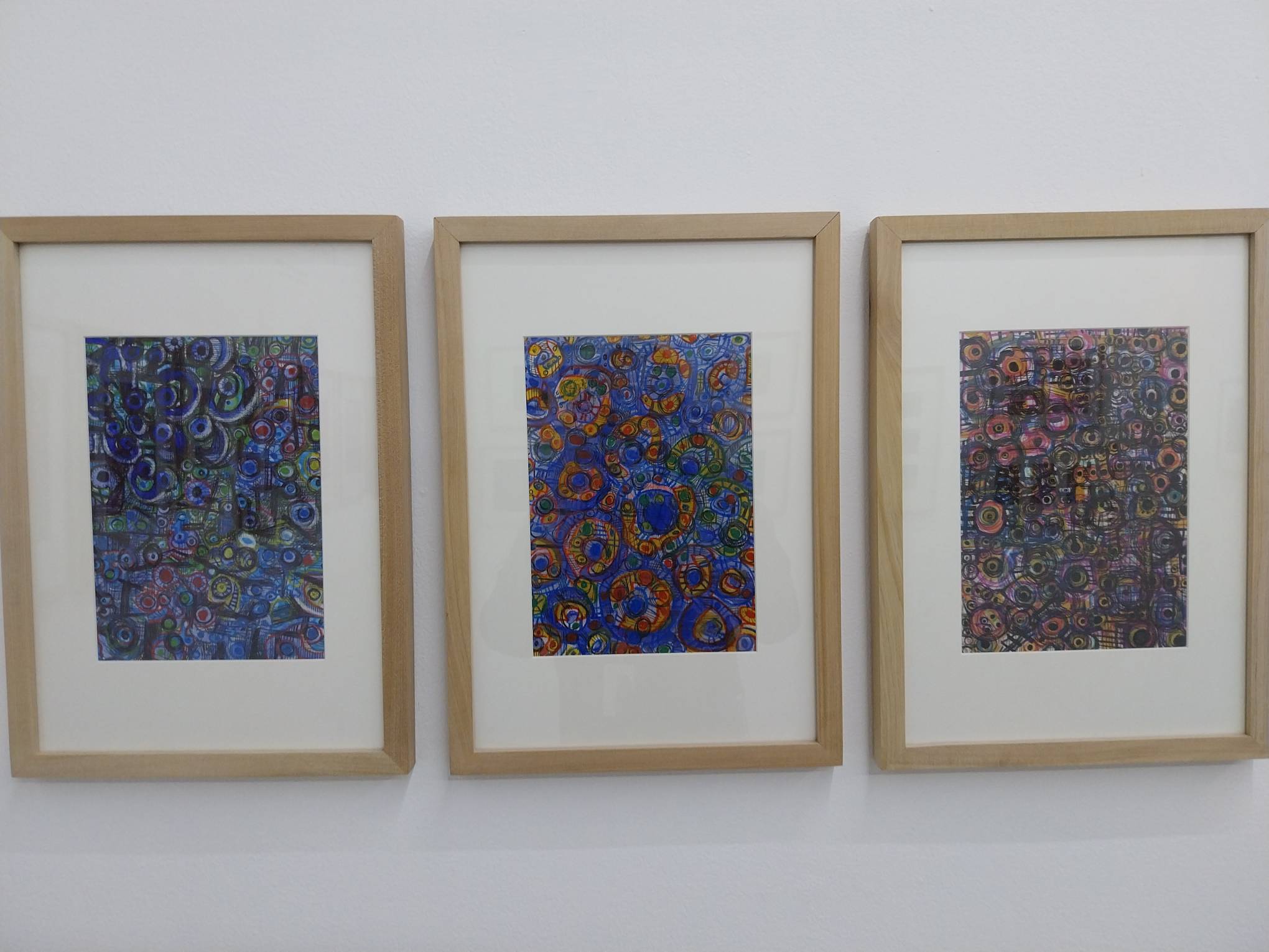 Three works by Elmer Nocheseda. Photo by Elle Yap.