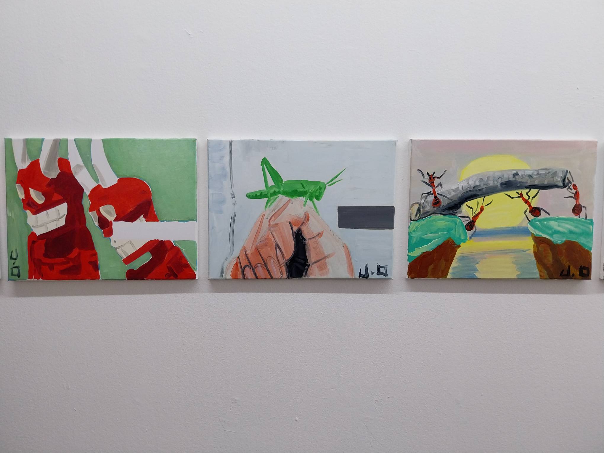 Three paintings by Jayson Oliveria. Photo by Elle Yap.