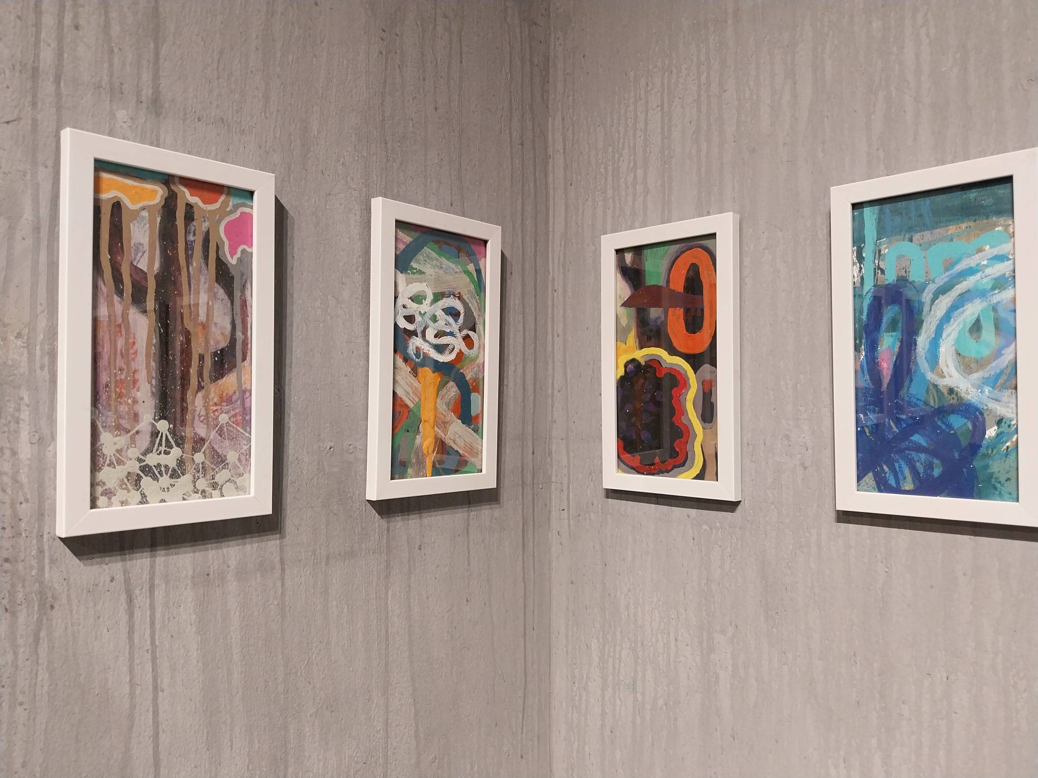 Four "Rollercoaster" paintings as shown in the "Washing Machine" exhibit in Super Duper Gallery. Photo by Elle Yap.