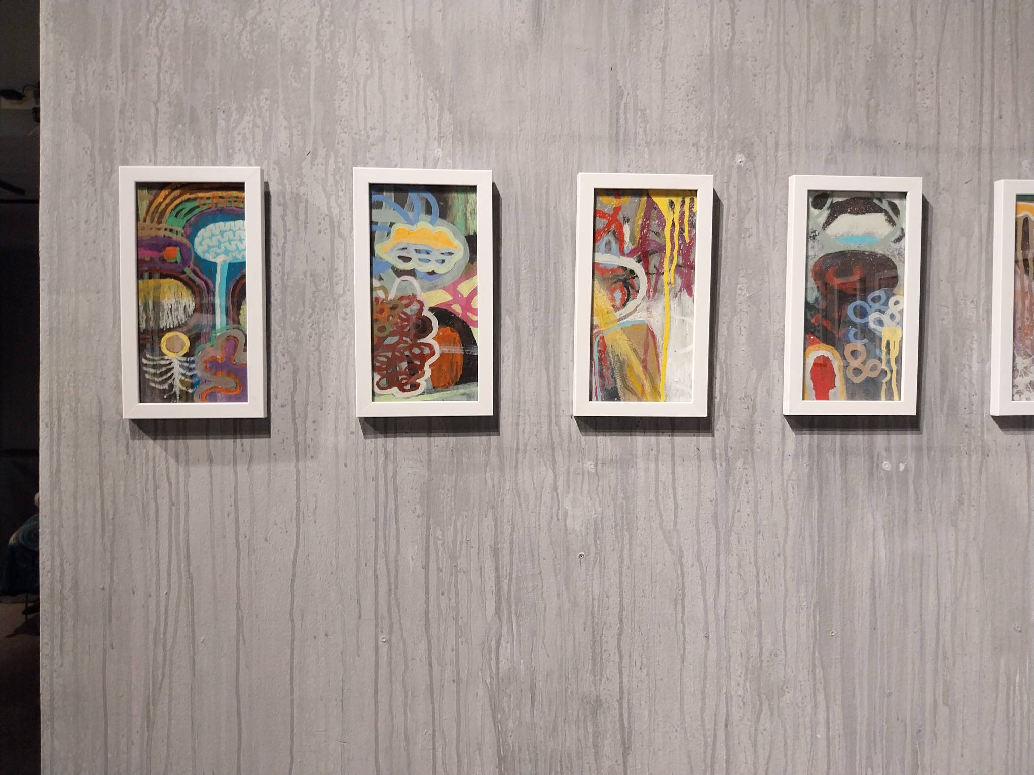 Four of the paintings under the "Rollercoaster" collection by Erwin Teves Pascual. Photo by Elle Yap.