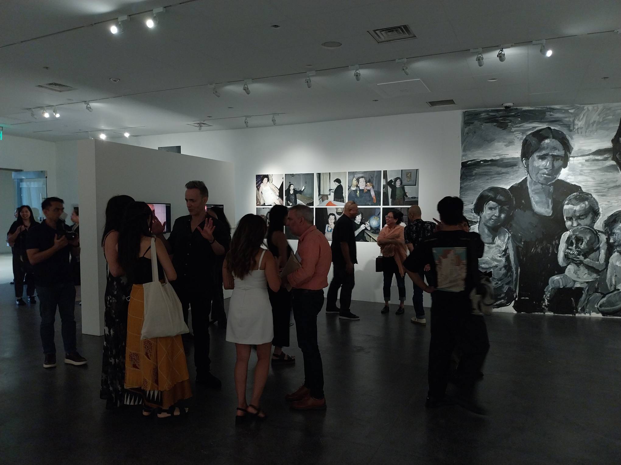 The crowd at "Project Belonging" opening. Photo by Patricia Yap.