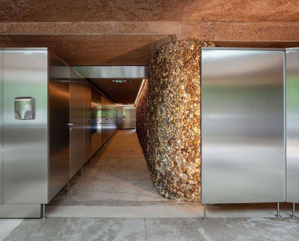 Hallway with toilets. Photo by Yves Marchand, Romain Meffre, and Hervé Piraud. 