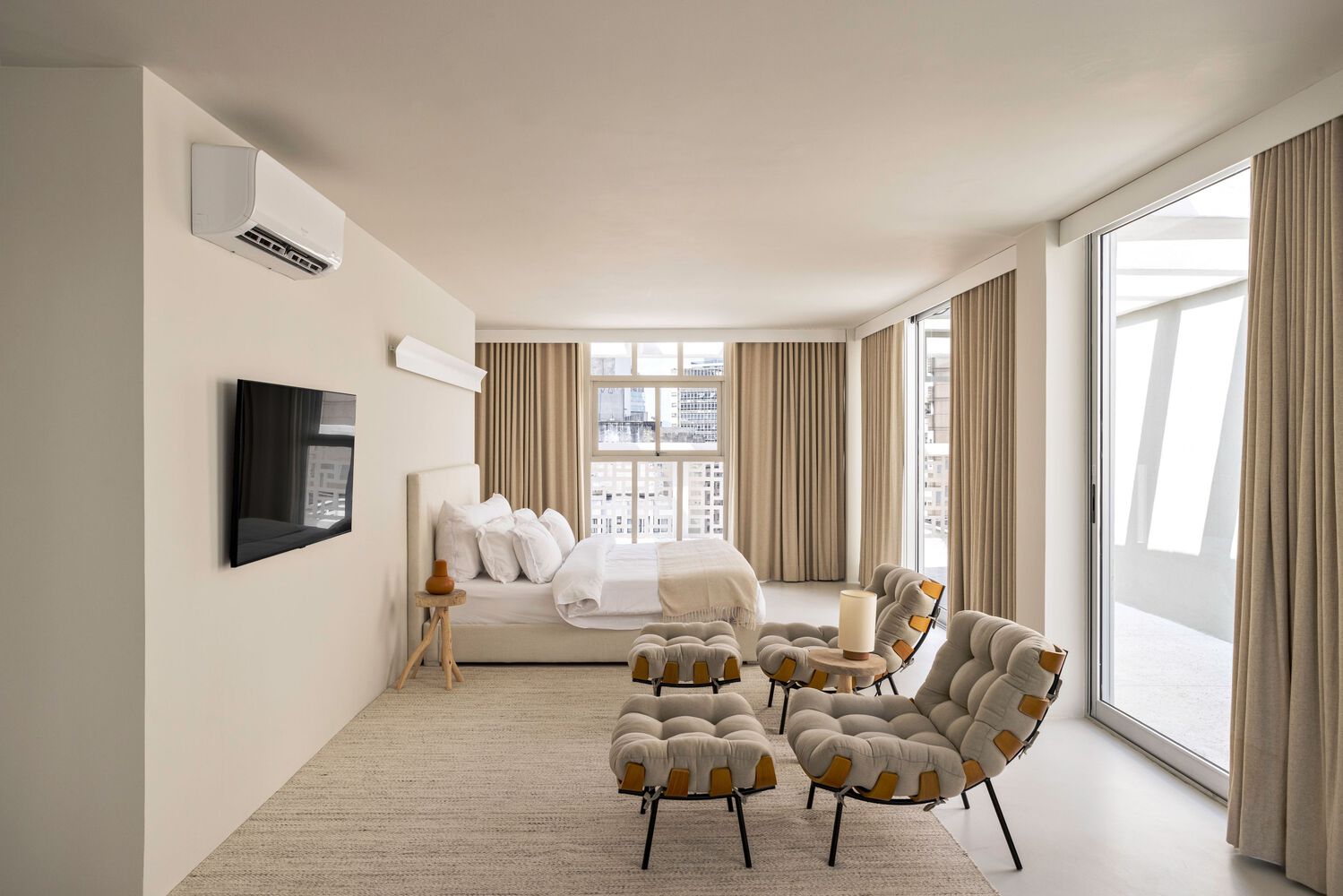 Bedroom area of an apartment in the Renata Building. Photo by Fran Parente.