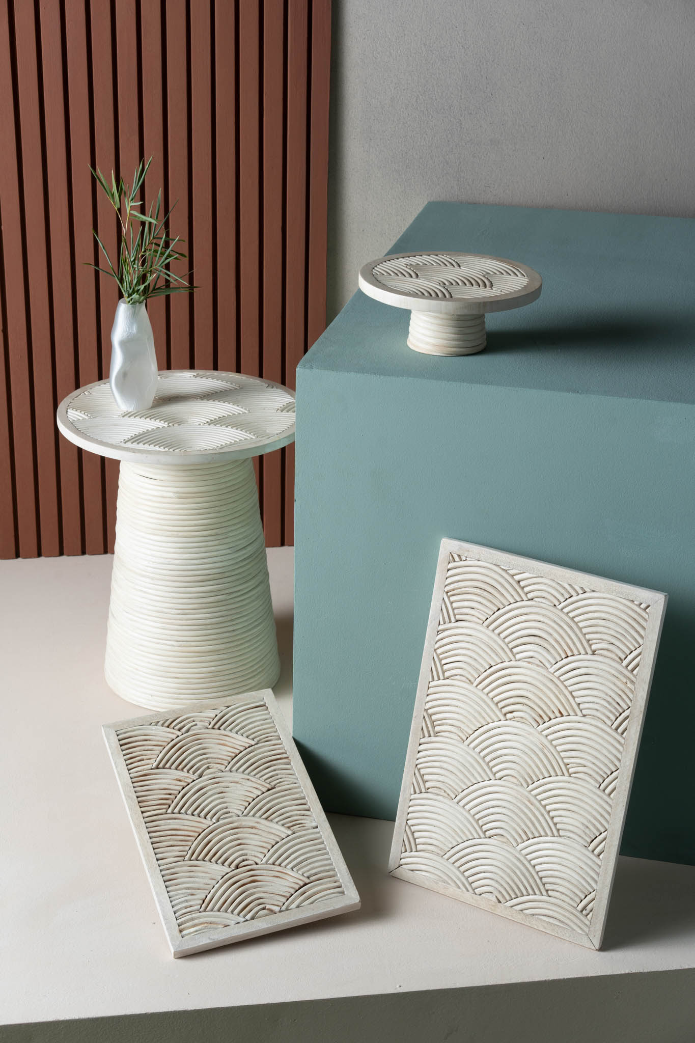 A vignette featuring a side table and home accessories at FINOPINAS.