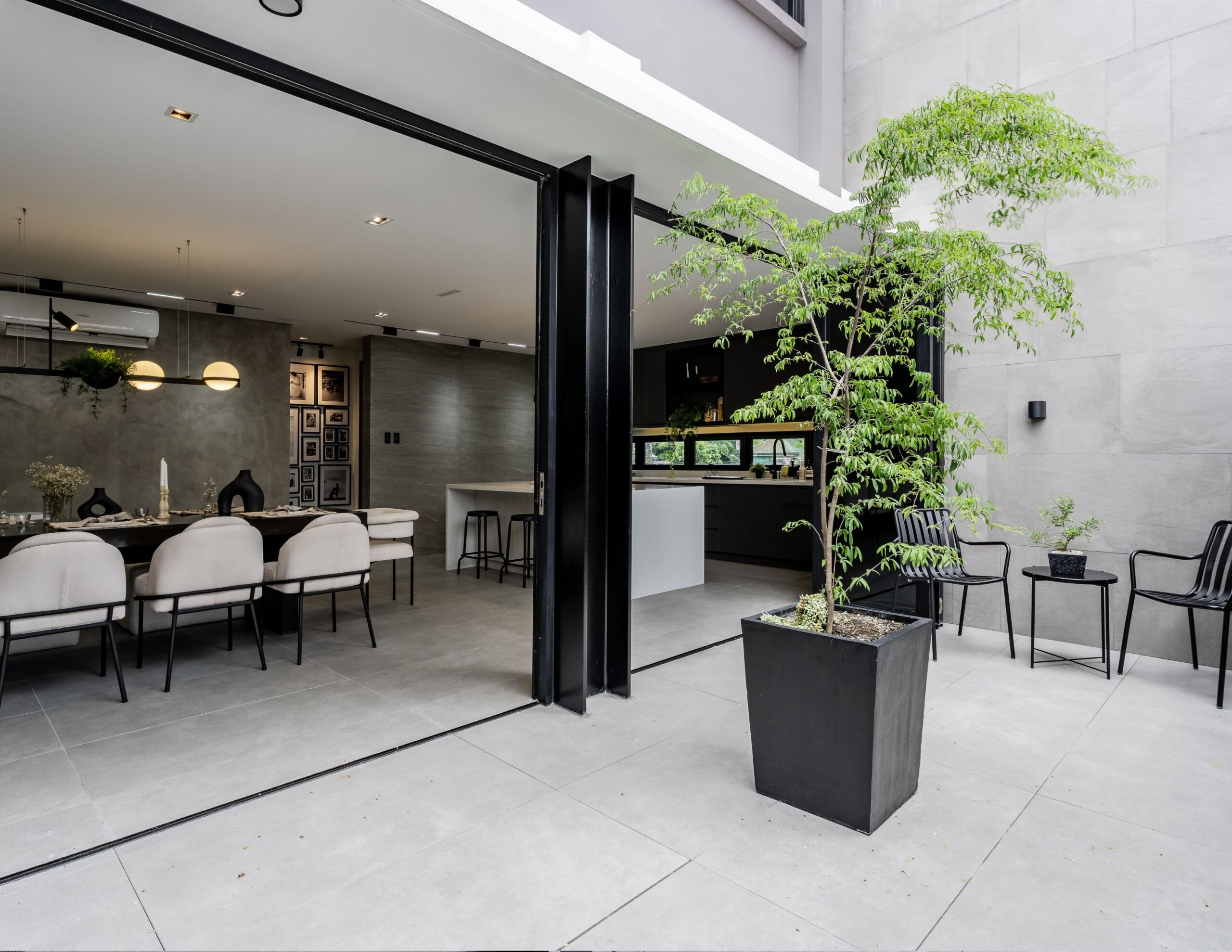 A second level courtyard extends the living areas while flooding V House with natural light.