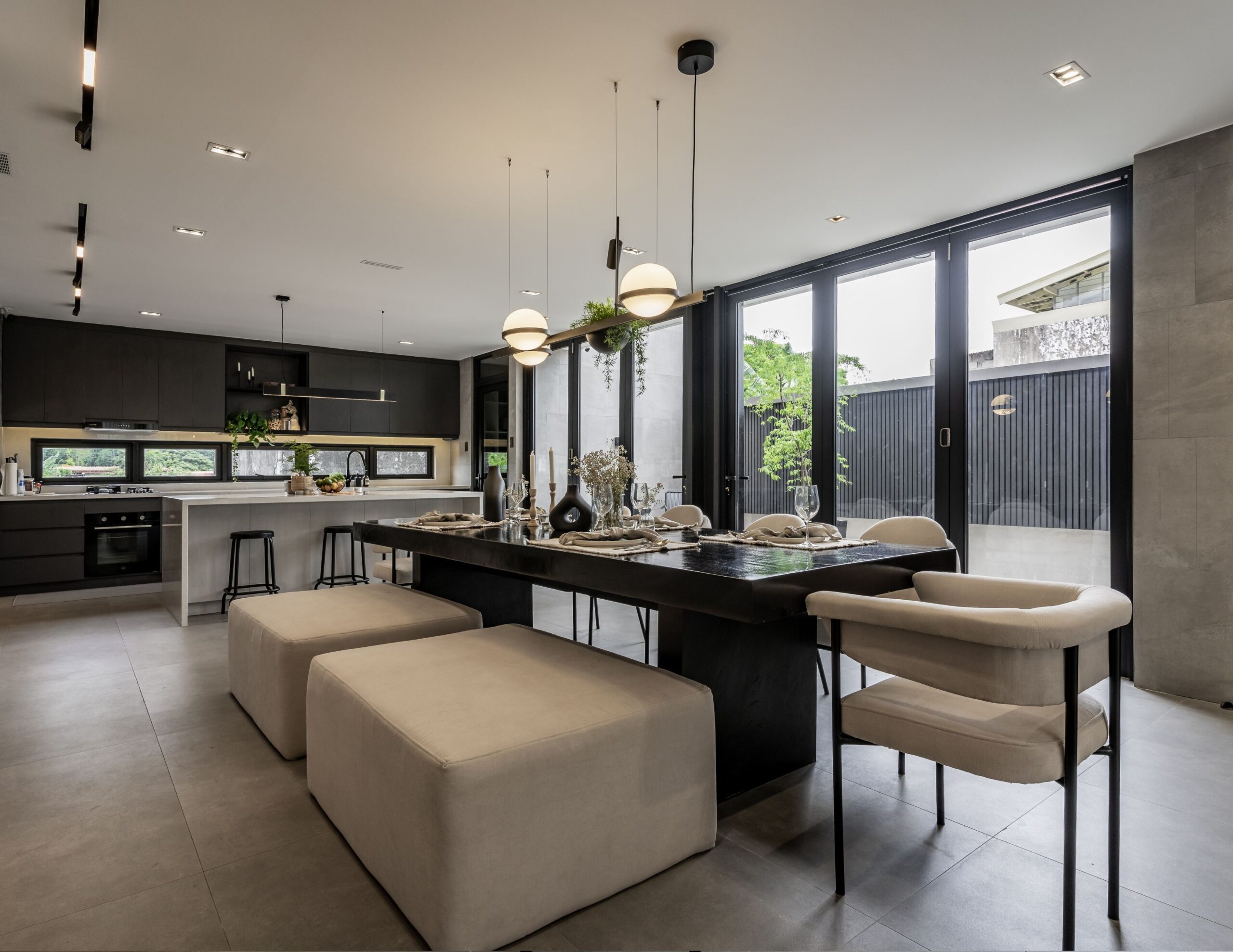 The modern dining and kitchen area of V House.