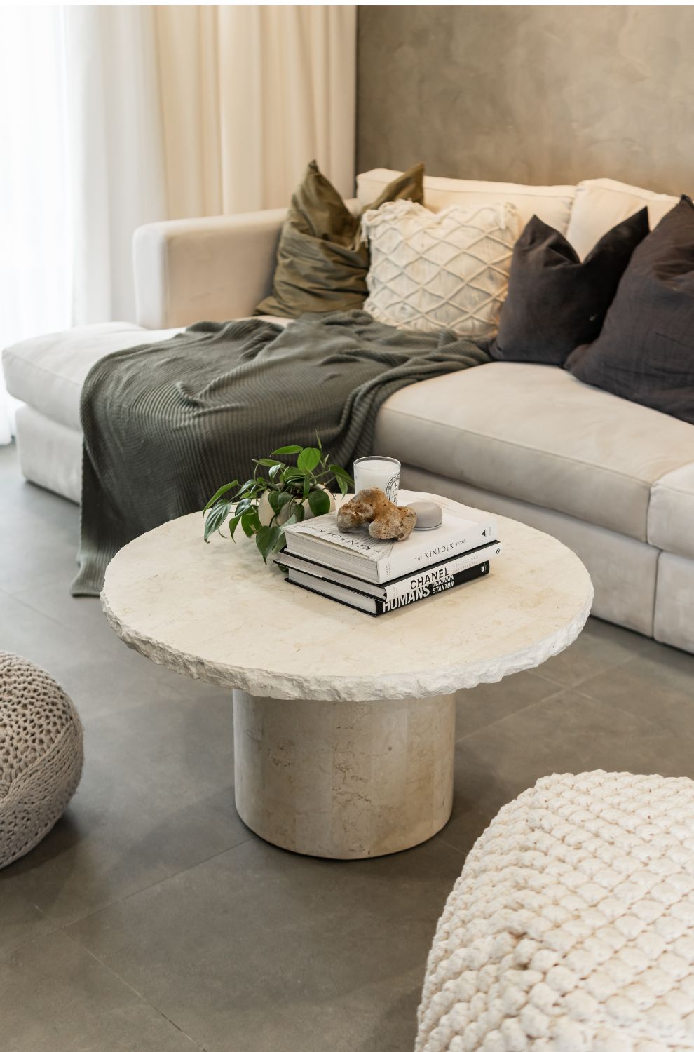 Stone and fabric textures offer a calming ambiance for its residents.