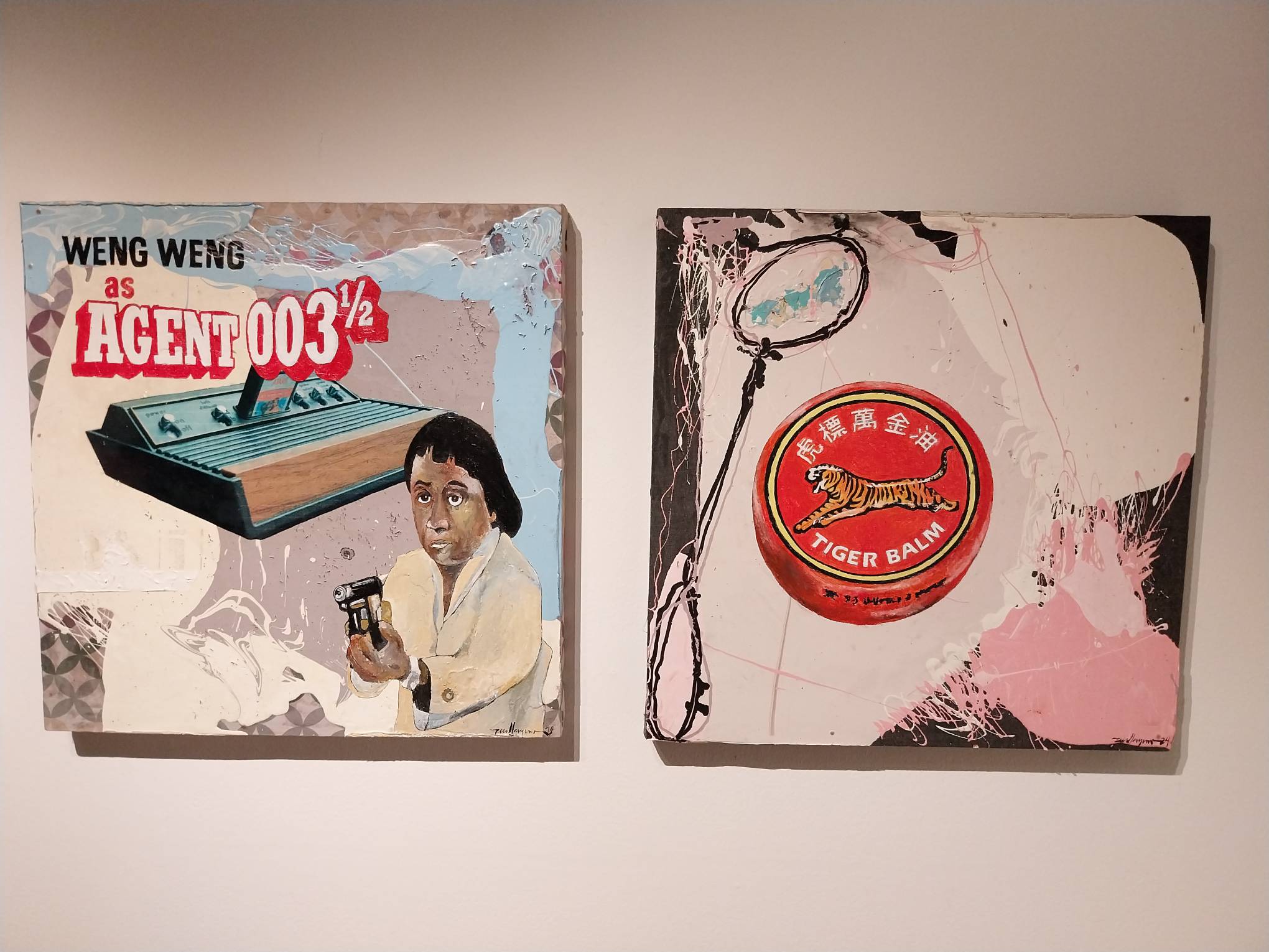 Two paintings for "Next Door to Nirvana and Back," including a tribute to B-movie star Weng Weng.