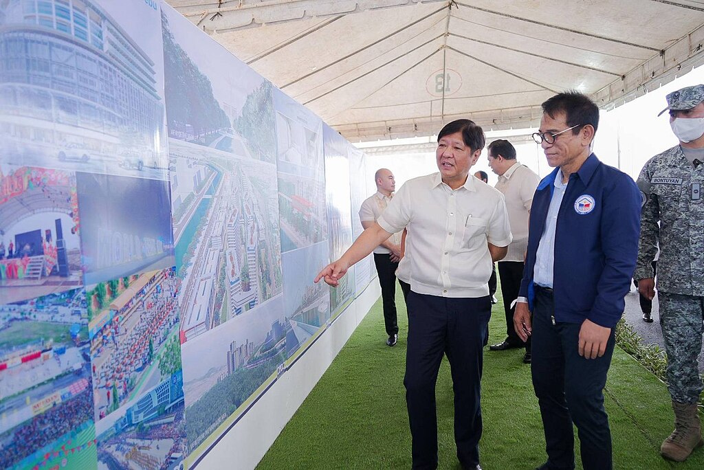 President Ferdinand Marcos, Jr. inspecting plans for a social housing project in Cebu. Photo by Presidential Communications Office. Source: Wikimedia Commons.