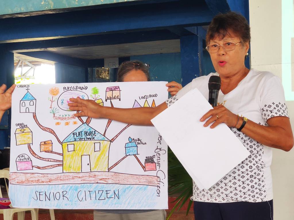 A community member presenting their ideal social housing community.