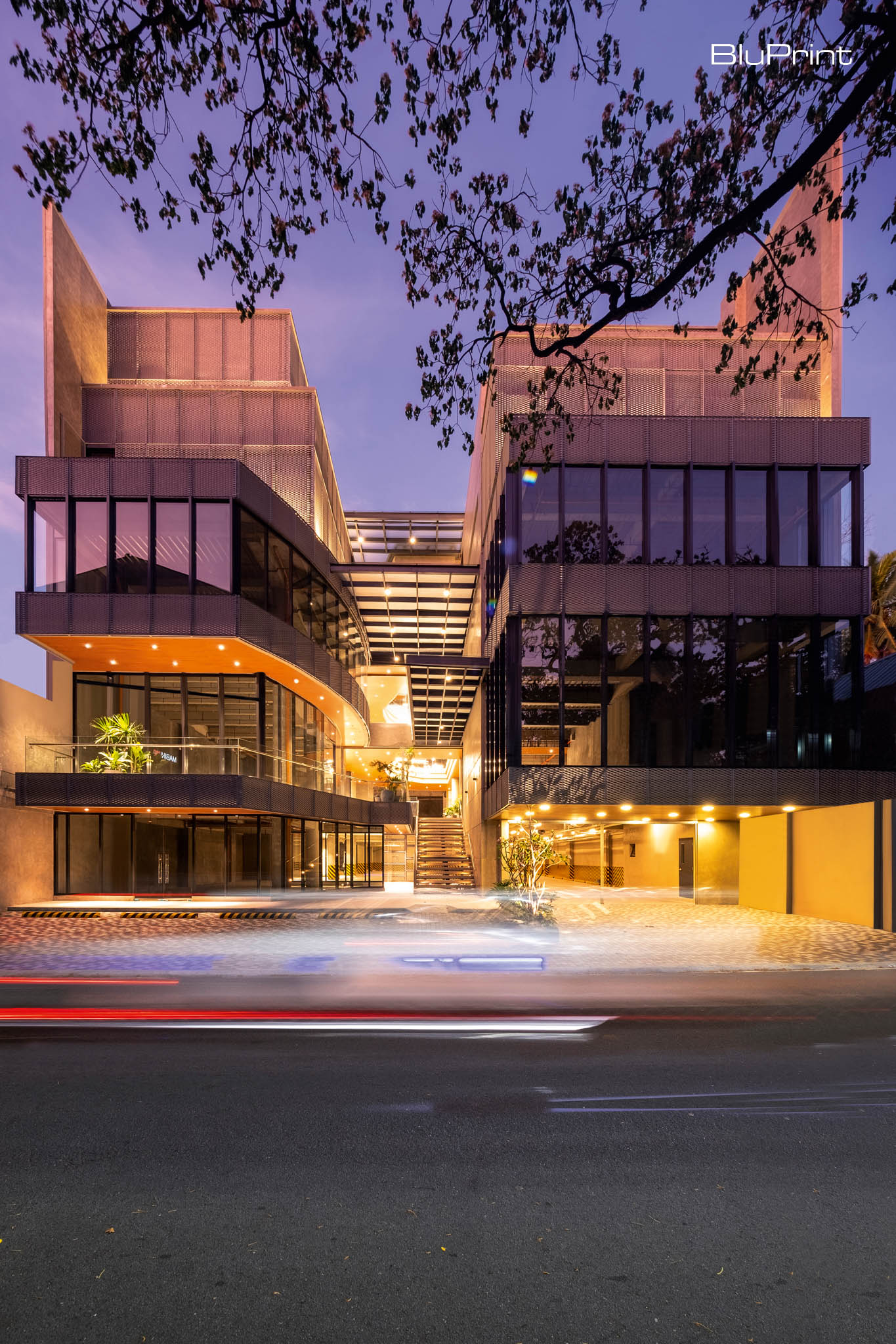 Mabini 180: Form Meets Purpose. Mabini180's facade shows raw concrete, large glass panels, and expanded aluminum mesh—true to the building's elevated industrial aesthetic